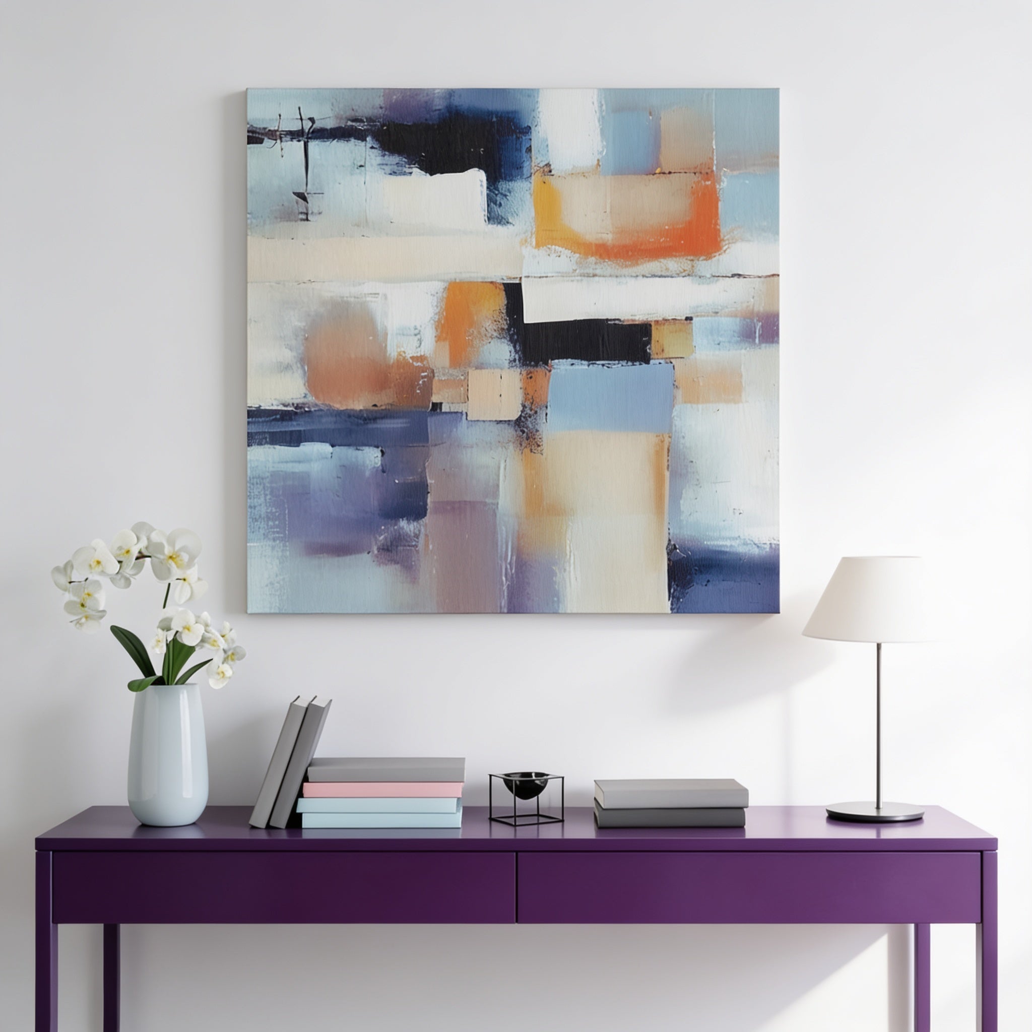 a purple console table with a vase of white flowers, a stack of books, and a lamp on it. Above the table, there is a large abstract painting hanging on the wall.