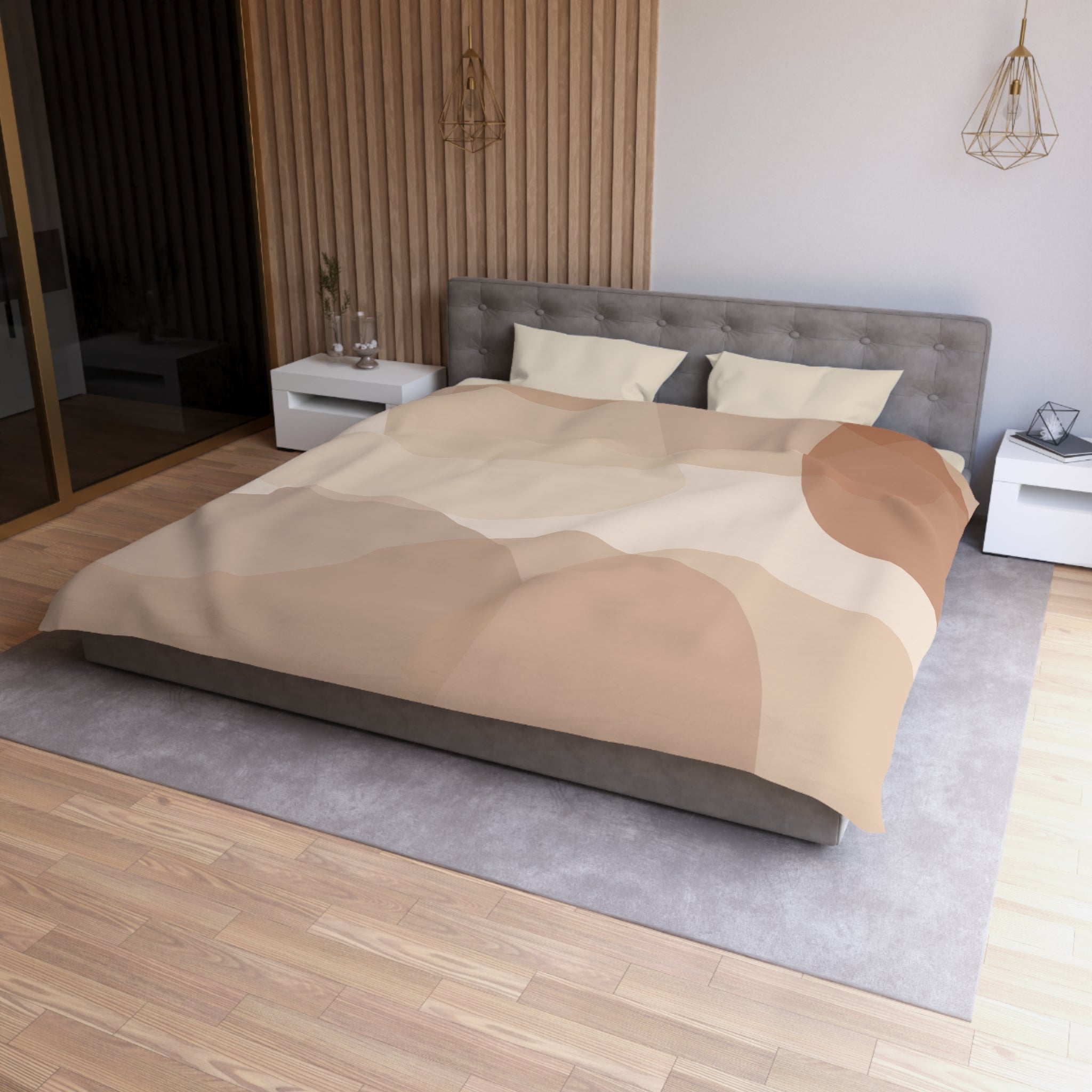 a modern bedroom with a large bed, a gray headboard, and a wooden wall. The bed has a beige and brown patterned comforter, and there are two pillows on it. The room also includes a nightstand, a rug, and a pendant light fixture.