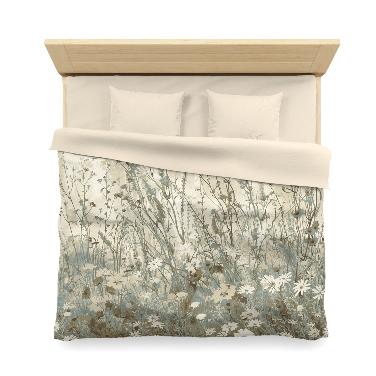 a neatly made bed with a floral patterned comforter and pillows.