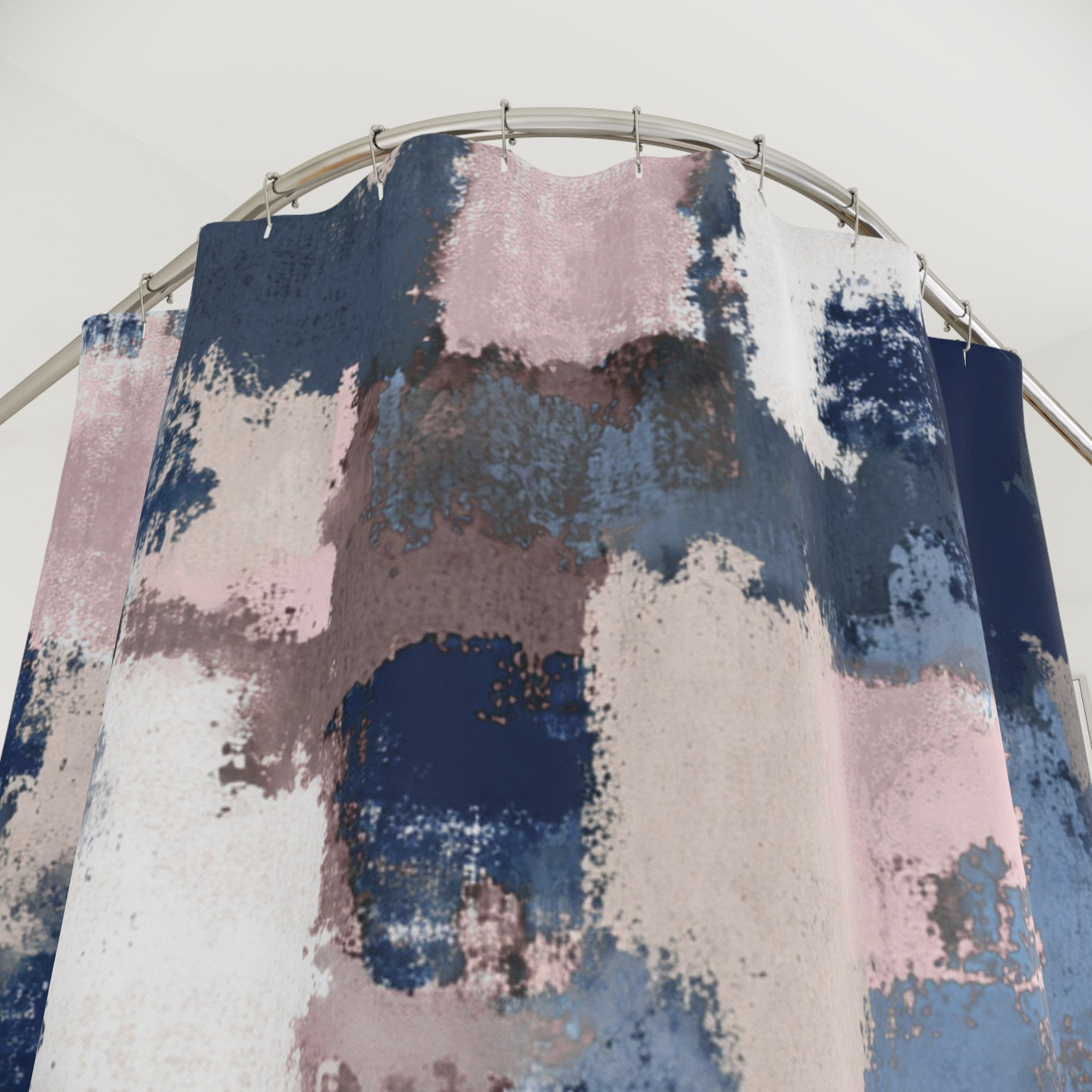 a shower curtain with a colorful abstract pattern in shades of blue, pink, and white.