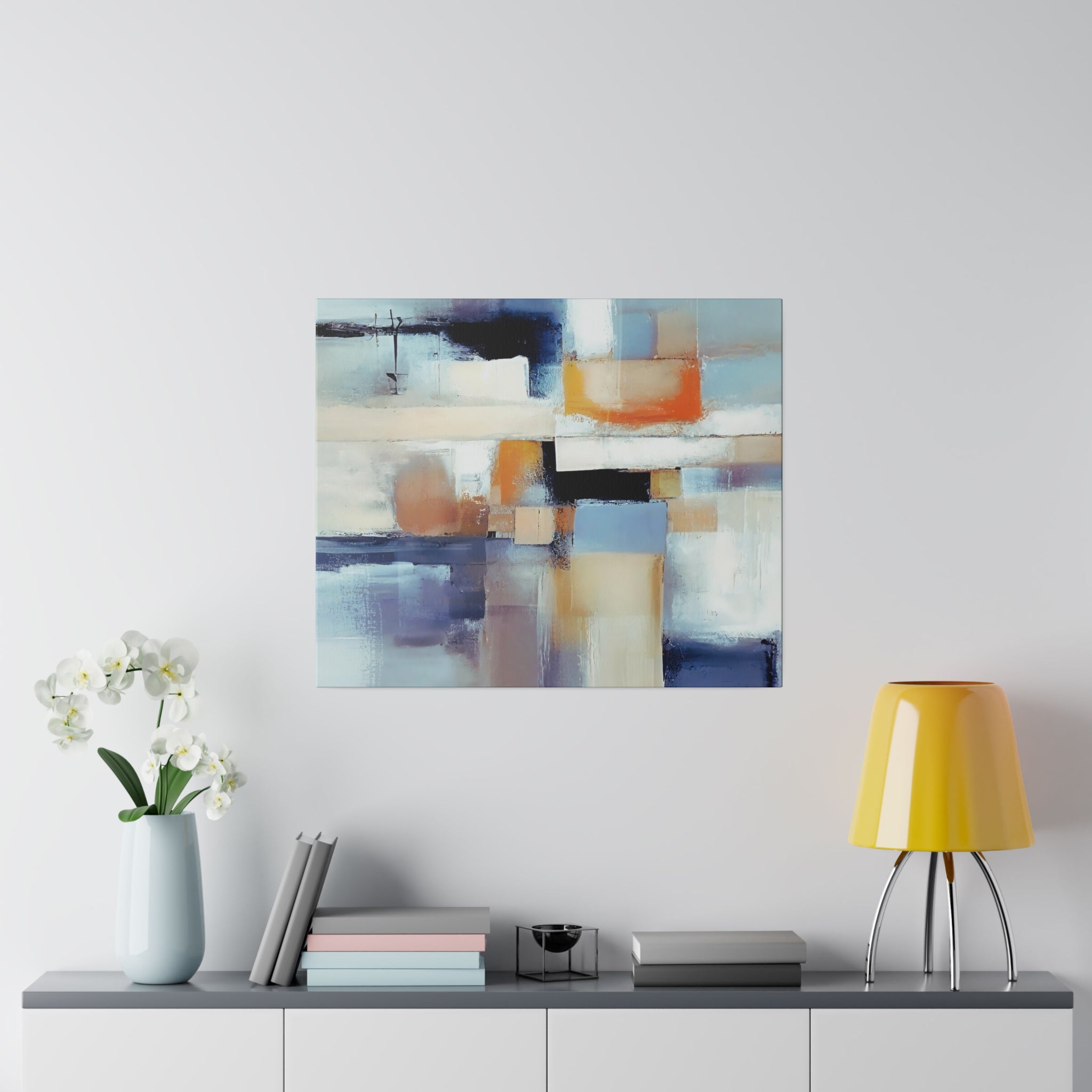 Blue and beige abstract canvas wall art in a bedroom setting