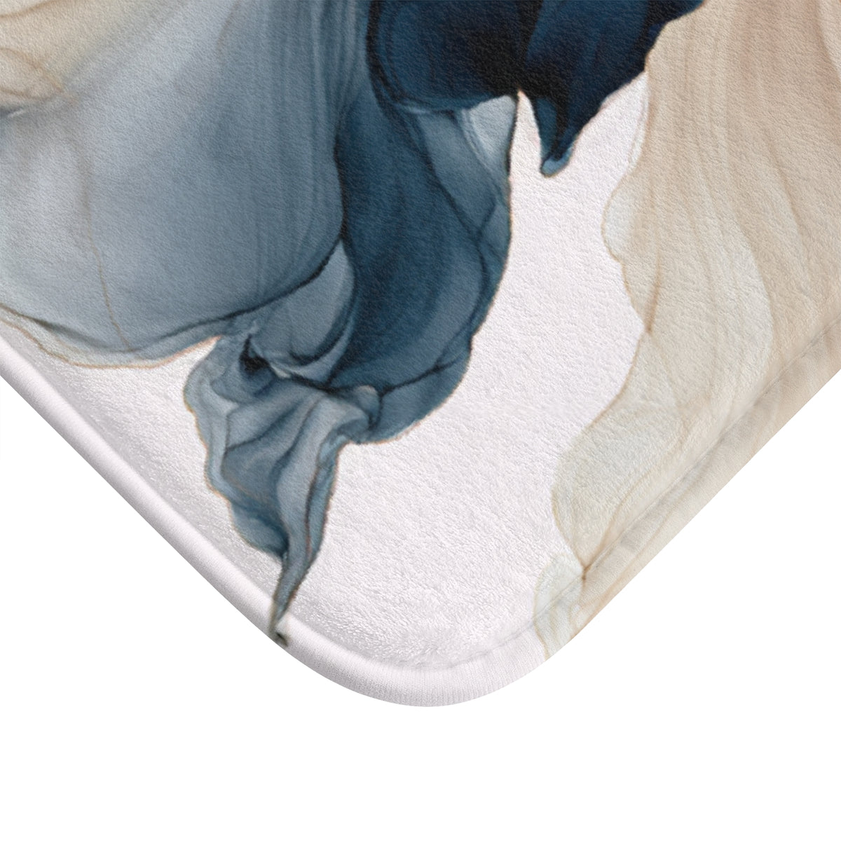 a close-up view of a textured surface with a floral pattern in shades of blue and beige.