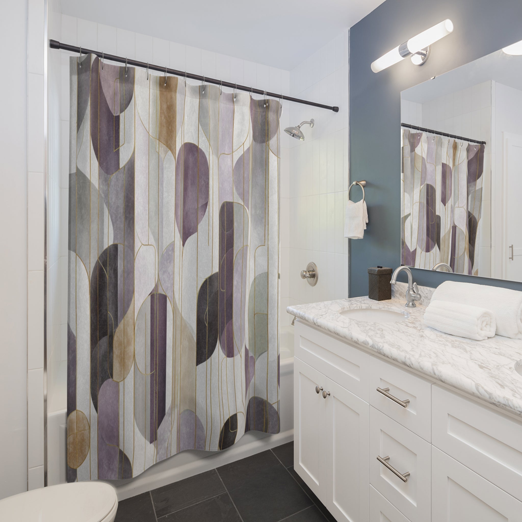 a modern bathroom with a white vanity, a shower curtain with a colorful abstract pattern, and a mirror above the vanity.