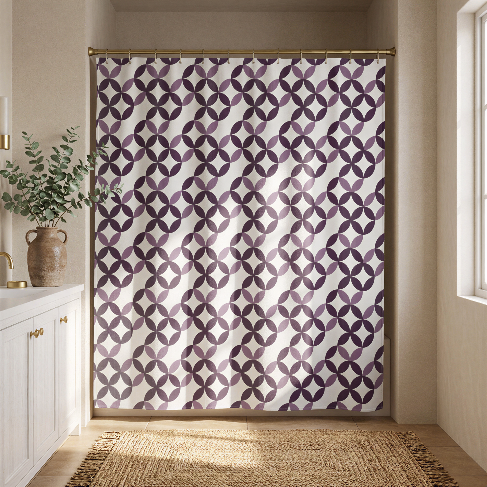 a bathroom with a shower curtain adorned with a repeating pattern of purple circles. The curtain is hanging from a rod, and there is a rug on the floor in front of the shower. A potted plant is placed on the left side of the image, adding a touch of greenery to the space.