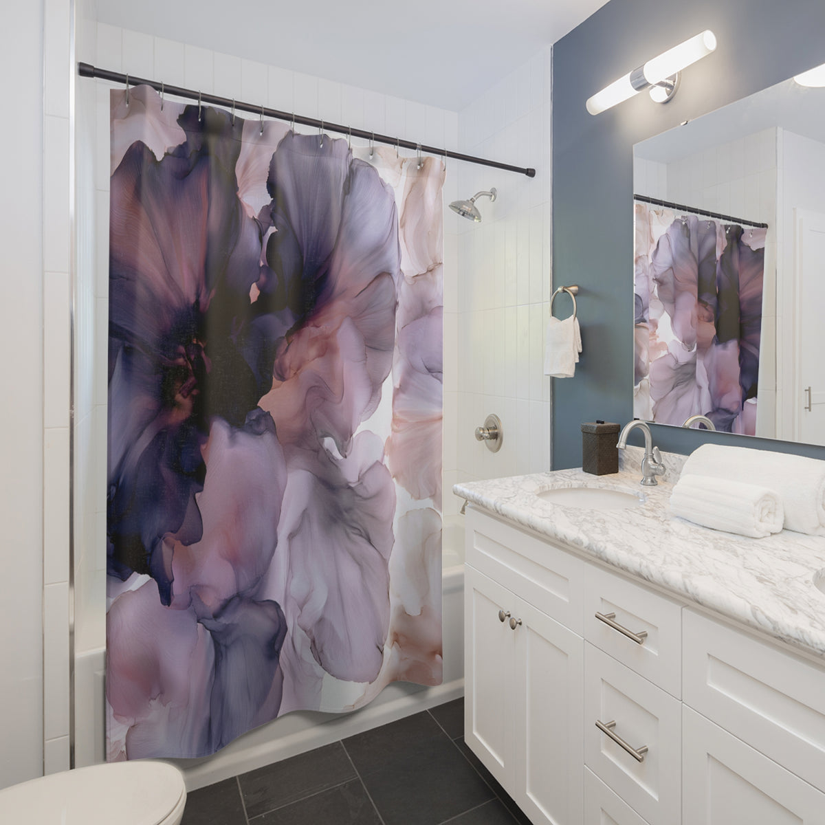 a bathroom with a shower curtain and a sink