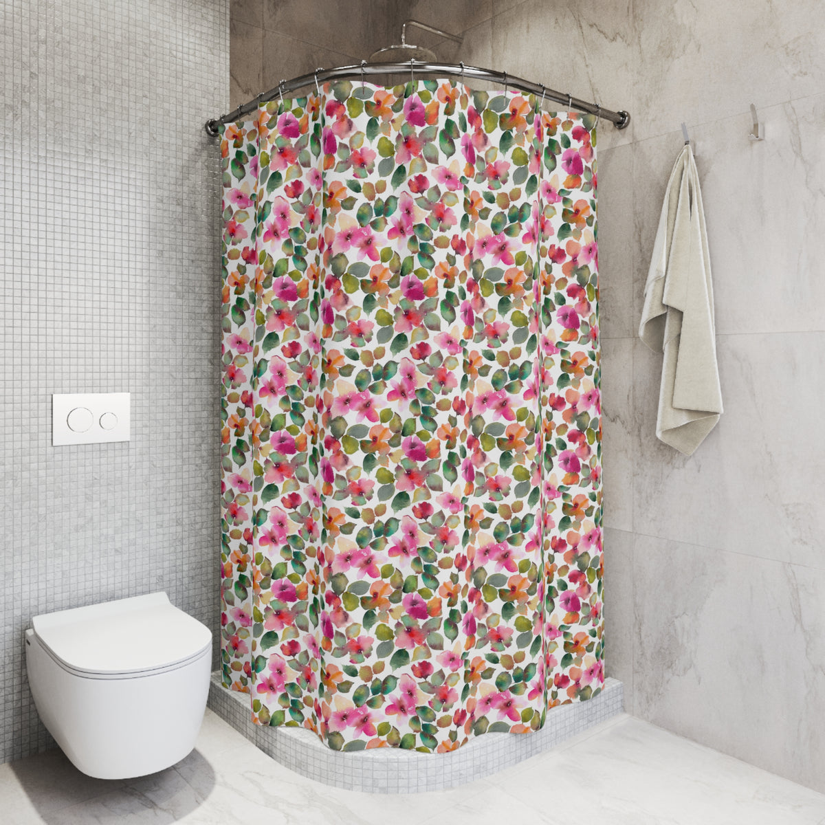 A bathroom with a white toilet and a colorful floral shower curtain.