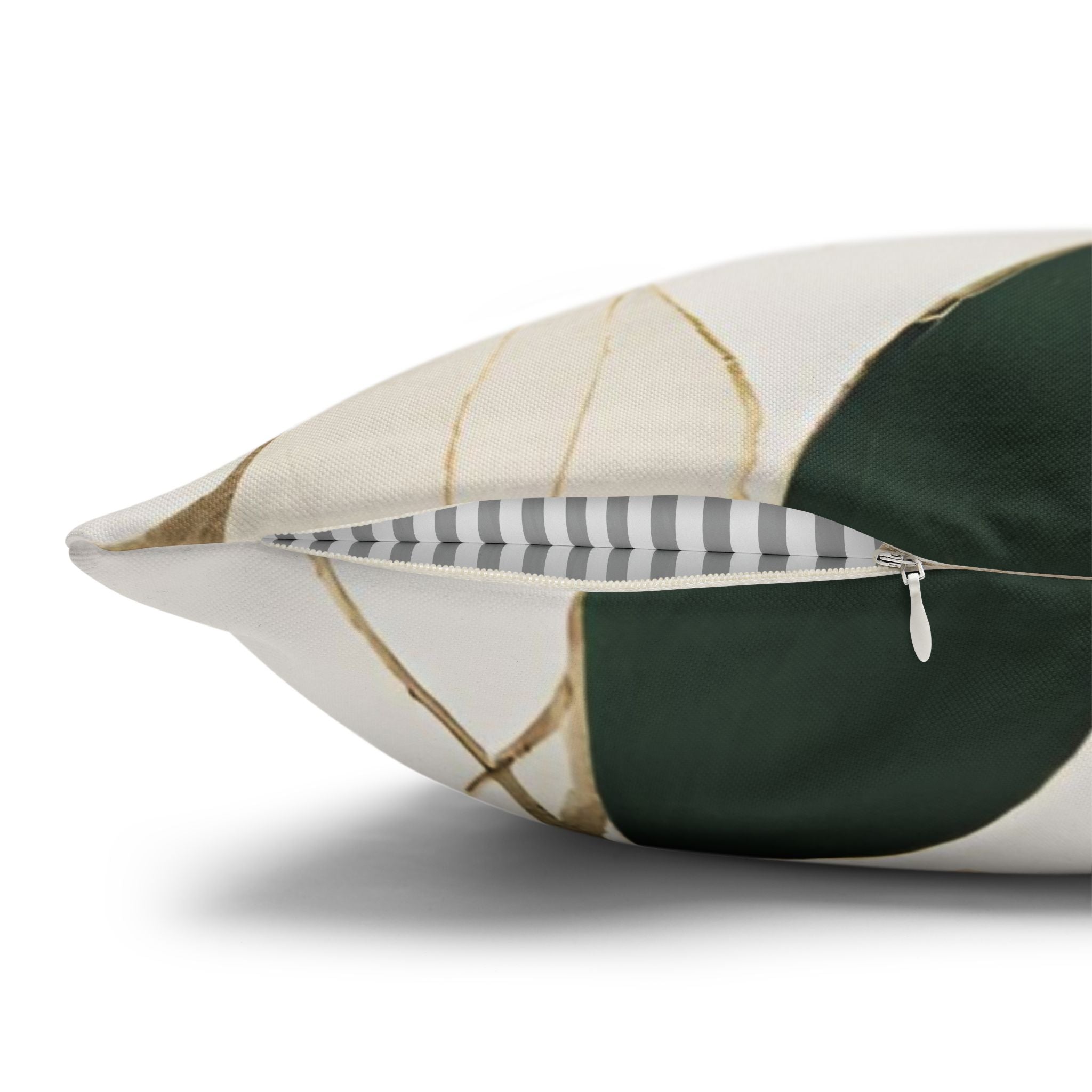 a close-up view of a pillow with a geometric pattern of green and white circles.