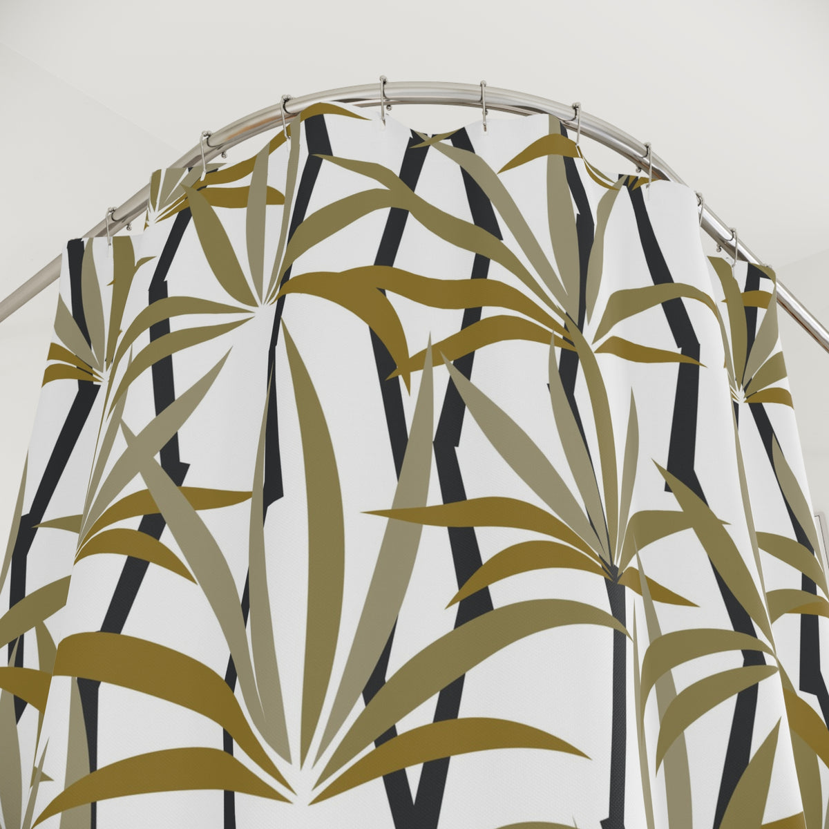 a shower curtain with a repeating pattern of green and black leaves or palm fronds.