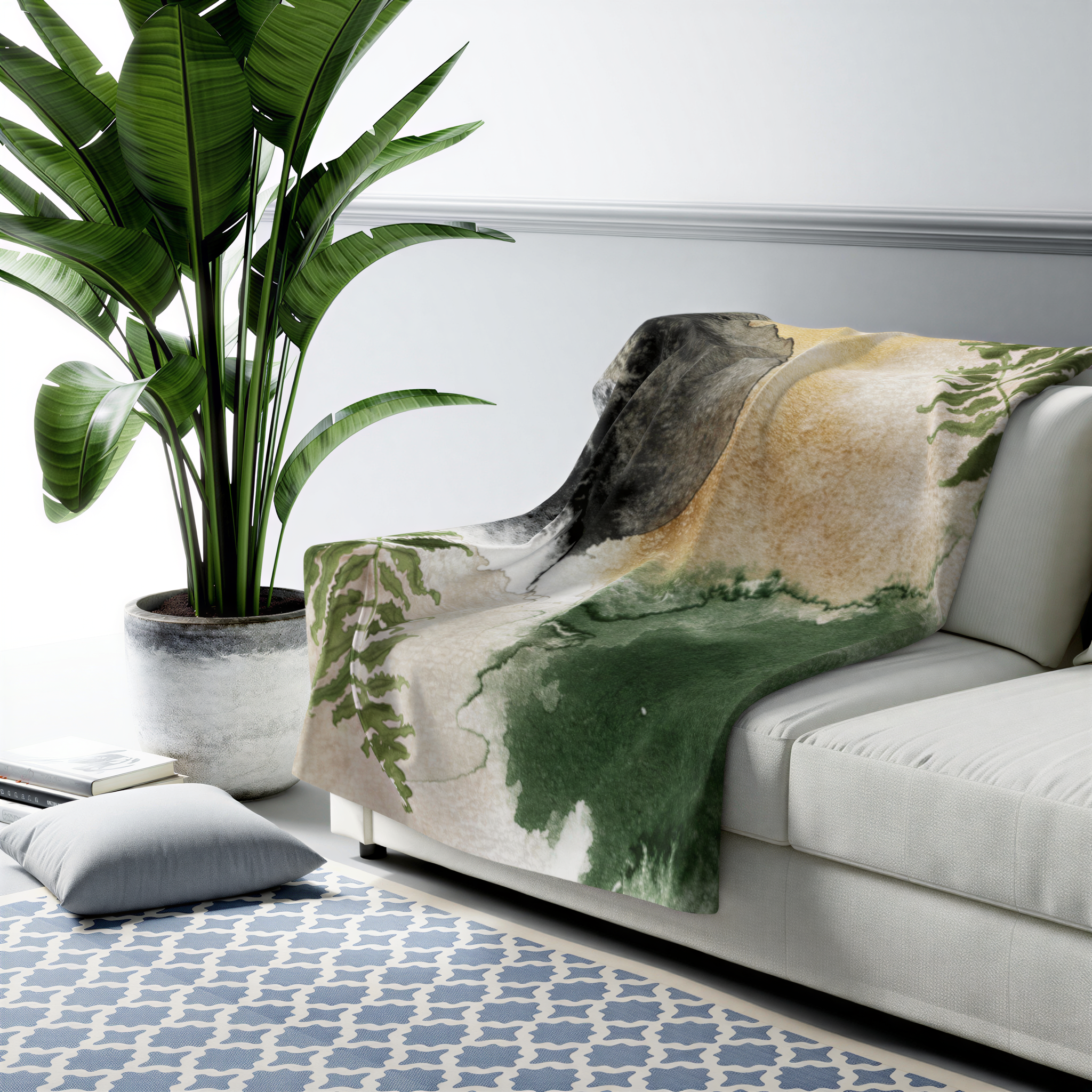 Black, ivory and forest green boho floral throw blanket in a bright modern space