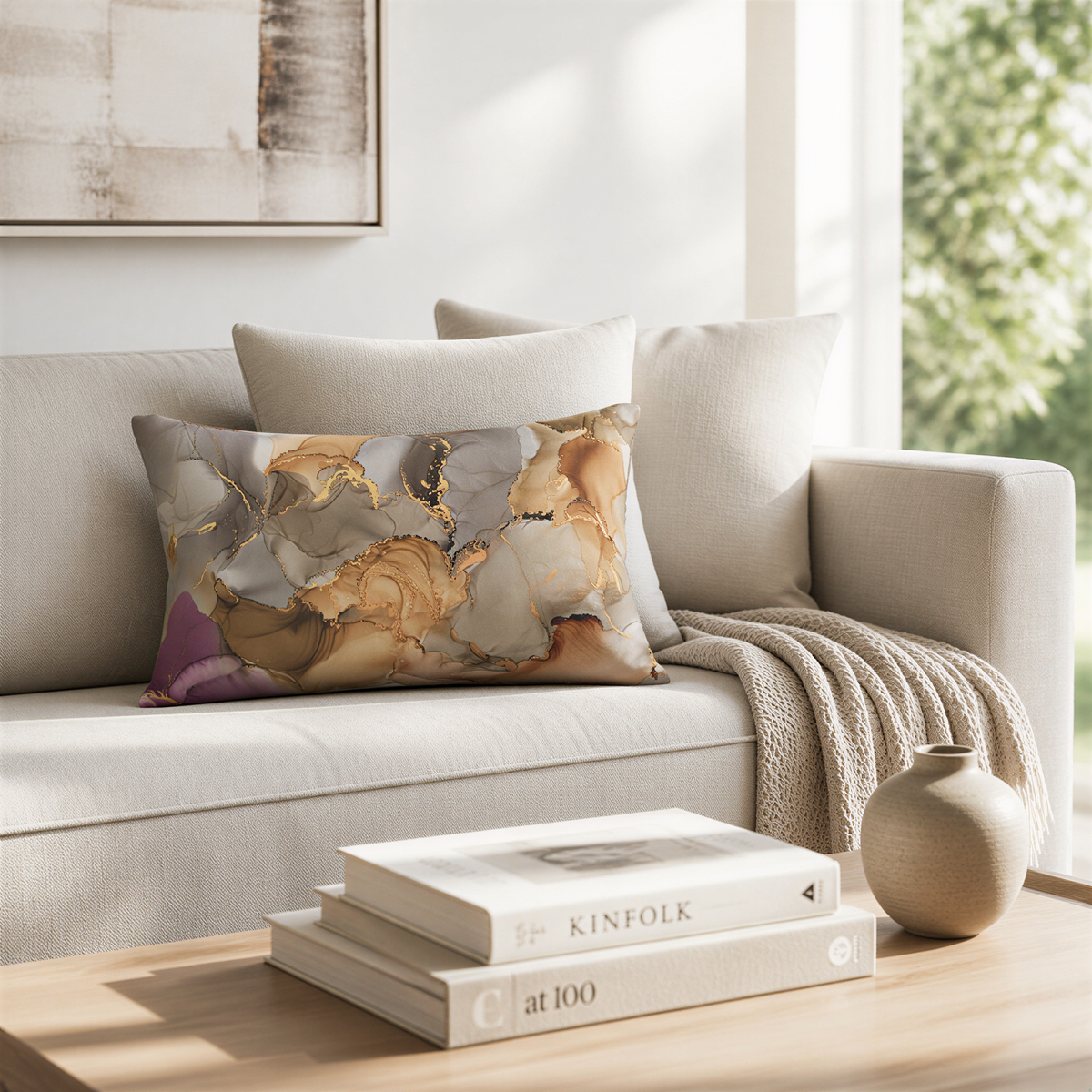 a cozy living room with a beige sofa, a stack of books, and a decorative vase.