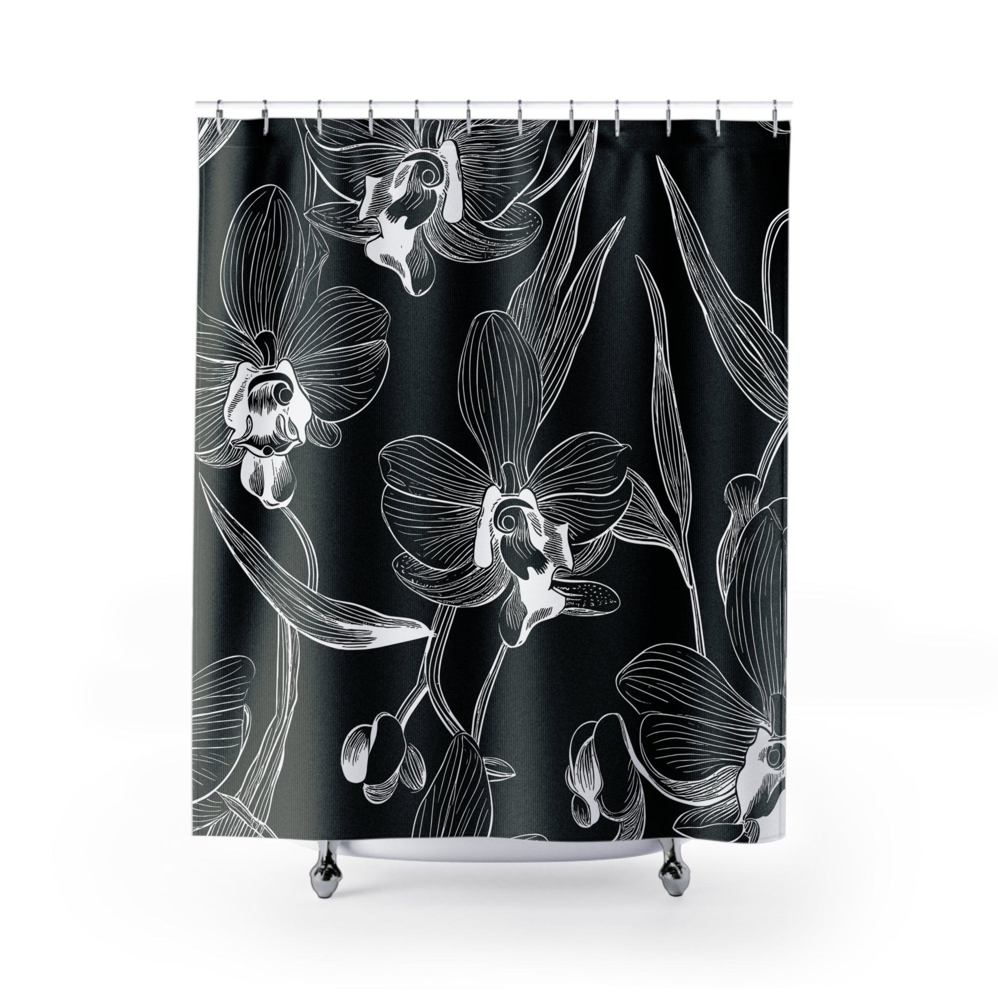 a shower curtain with black and white flowers on it