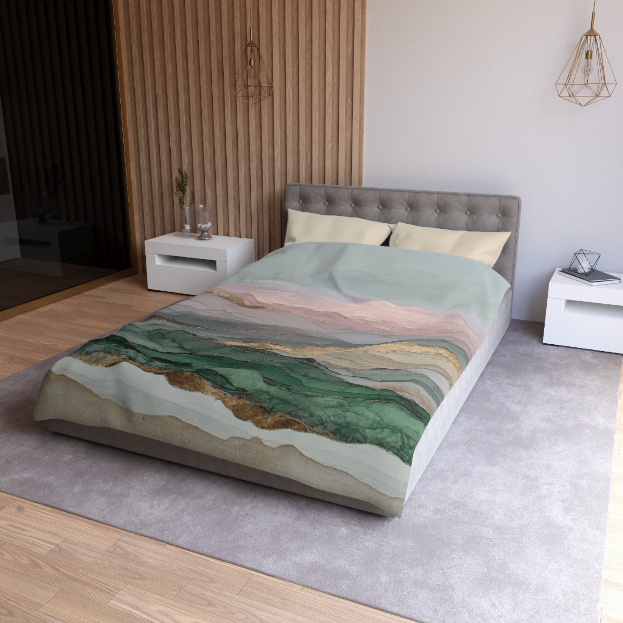 a modern bedroom with a large bed, a gray headboard, and a colorful bedspread featuring a mountain landscape design.