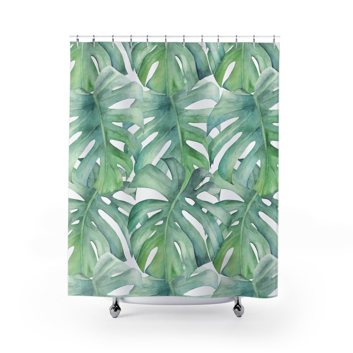 a shower curtain with a repeating pattern of large green leaves, creating a tropical and lush appearance.