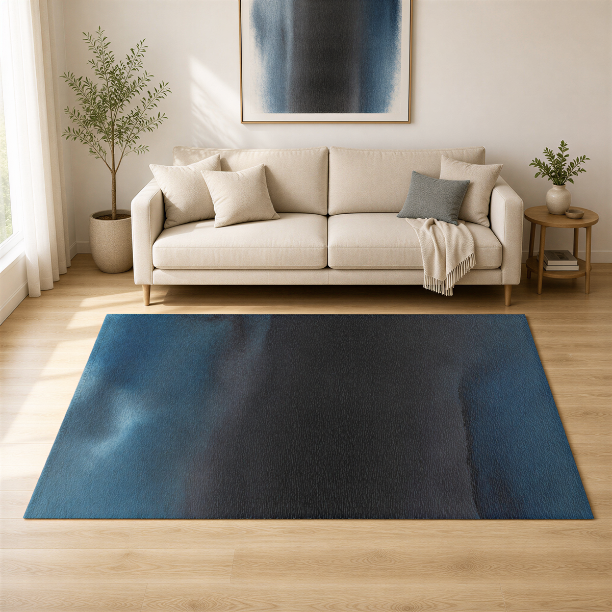 a living room with a beige sofa, a blue area rug, and a large abstract painting on the wall.