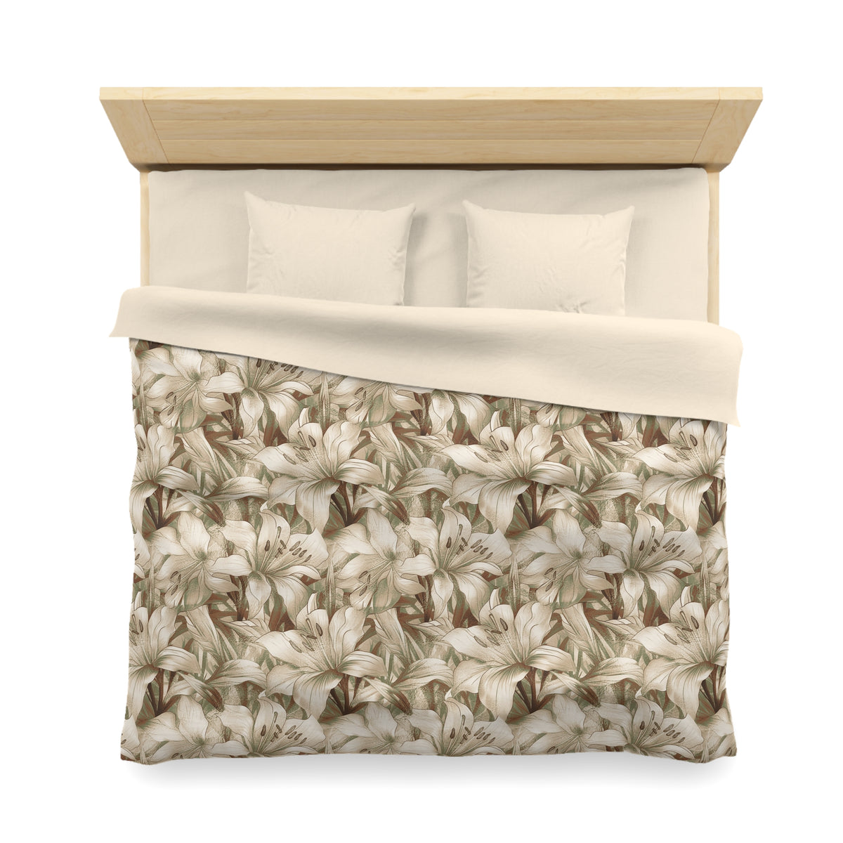 a neatly made bed with a floral print comforter and two pillows.