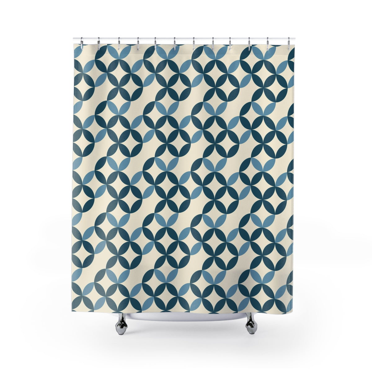a shower curtain with a repeating pattern of blue and white circles on a cream-colored background.