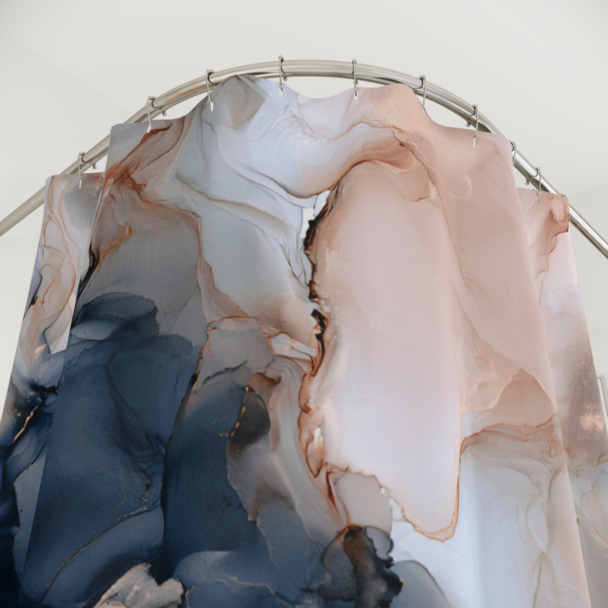 a shower curtain with a marble-like abstract pattern in shades of blue, pink, and white.