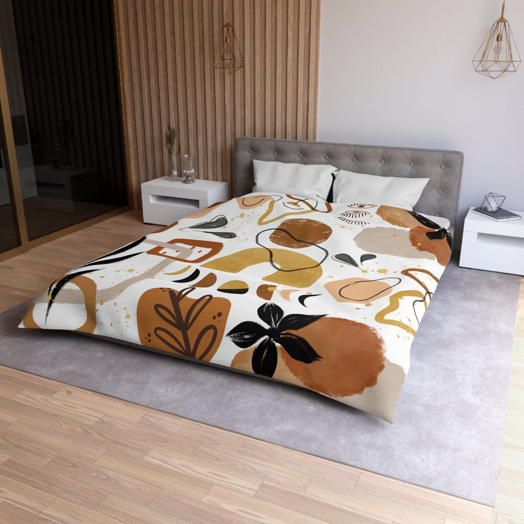 a modern bedroom with a large bed covered in a colorful abstract patterned comforter. The room has a neutral color scheme with a gray headboard and white nightstands. The overall design is contemporary and stylish.