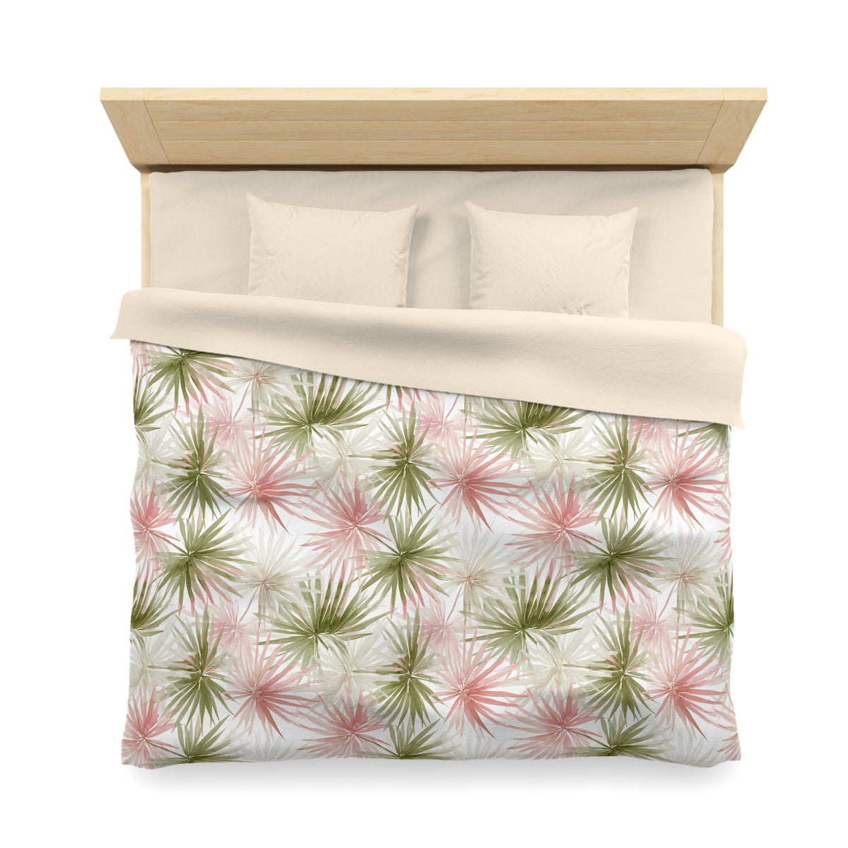 a neatly made bed with a floral print comforter and pillows.