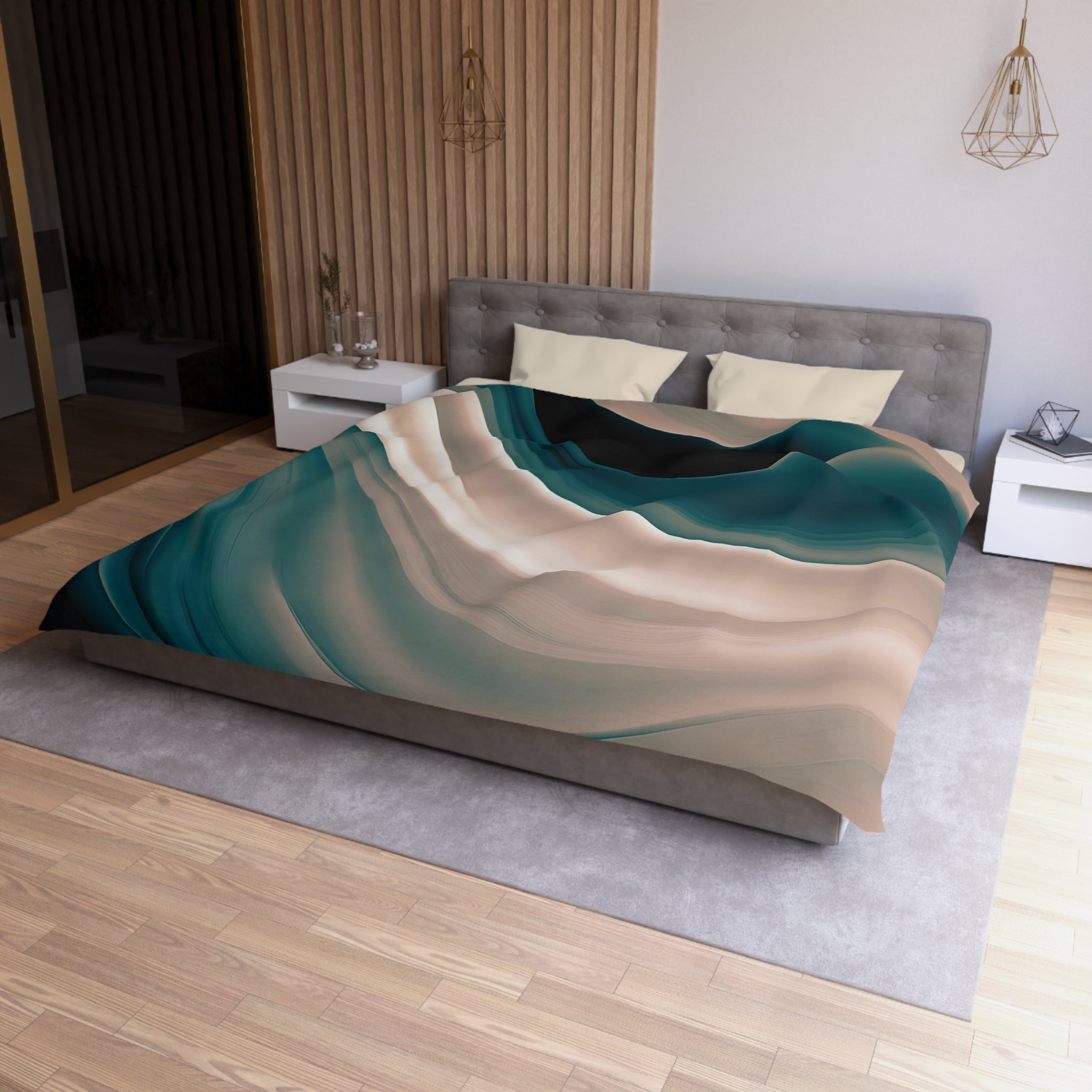 a modern bedroom with a large bed, a gray headboard, and a colorful abstract patterned comforter. The room has a wooden floor and white walls, creating a clean and minimalist aesthetic.