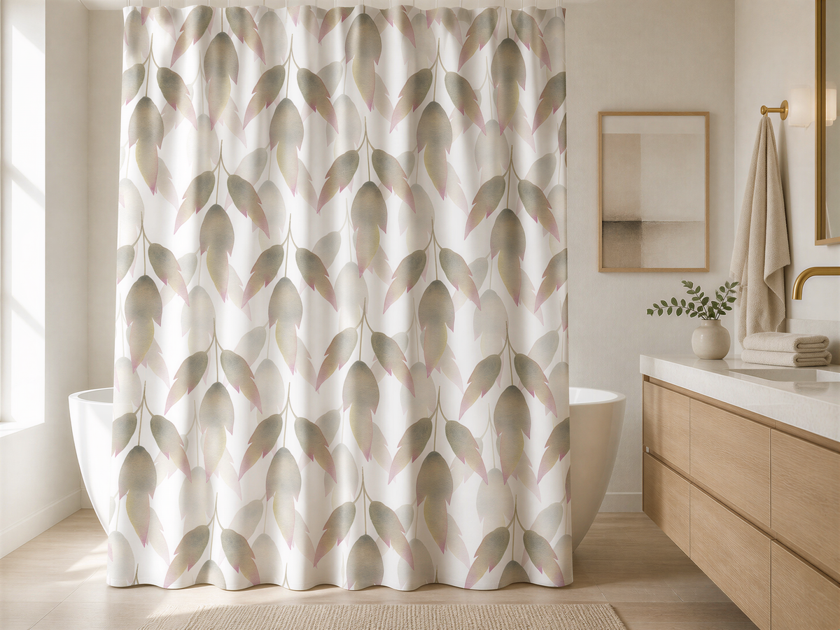 a bathroom with a shower curtain featuring a leaf pattern in shades of pink and green. The bathroom has a wooden vanity and a framed picture on the wall.