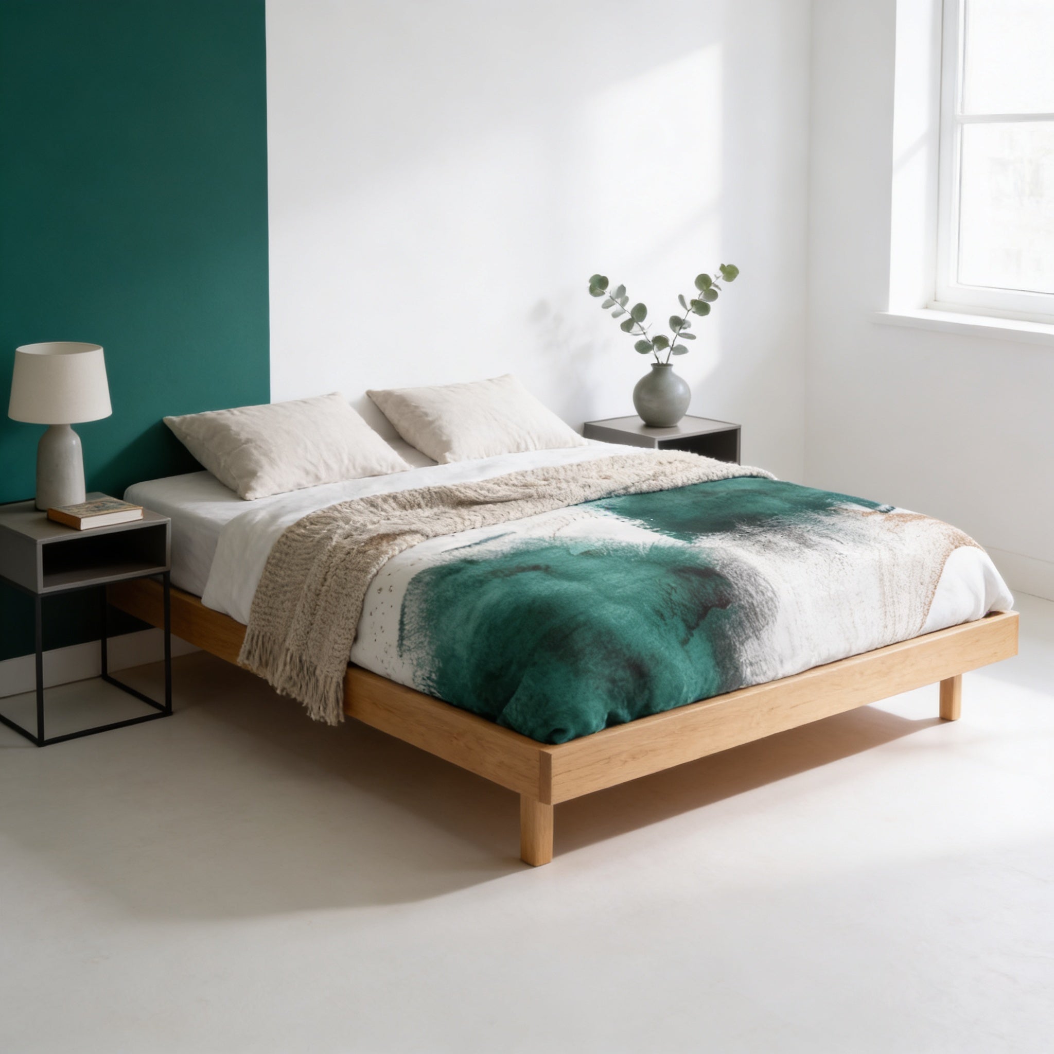 a modern bedroom with a wooden bed frame, a green and white patterned bedspread, and a nightstand with a lamp. The room has a white and green color scheme, and there is a window providing natural light.