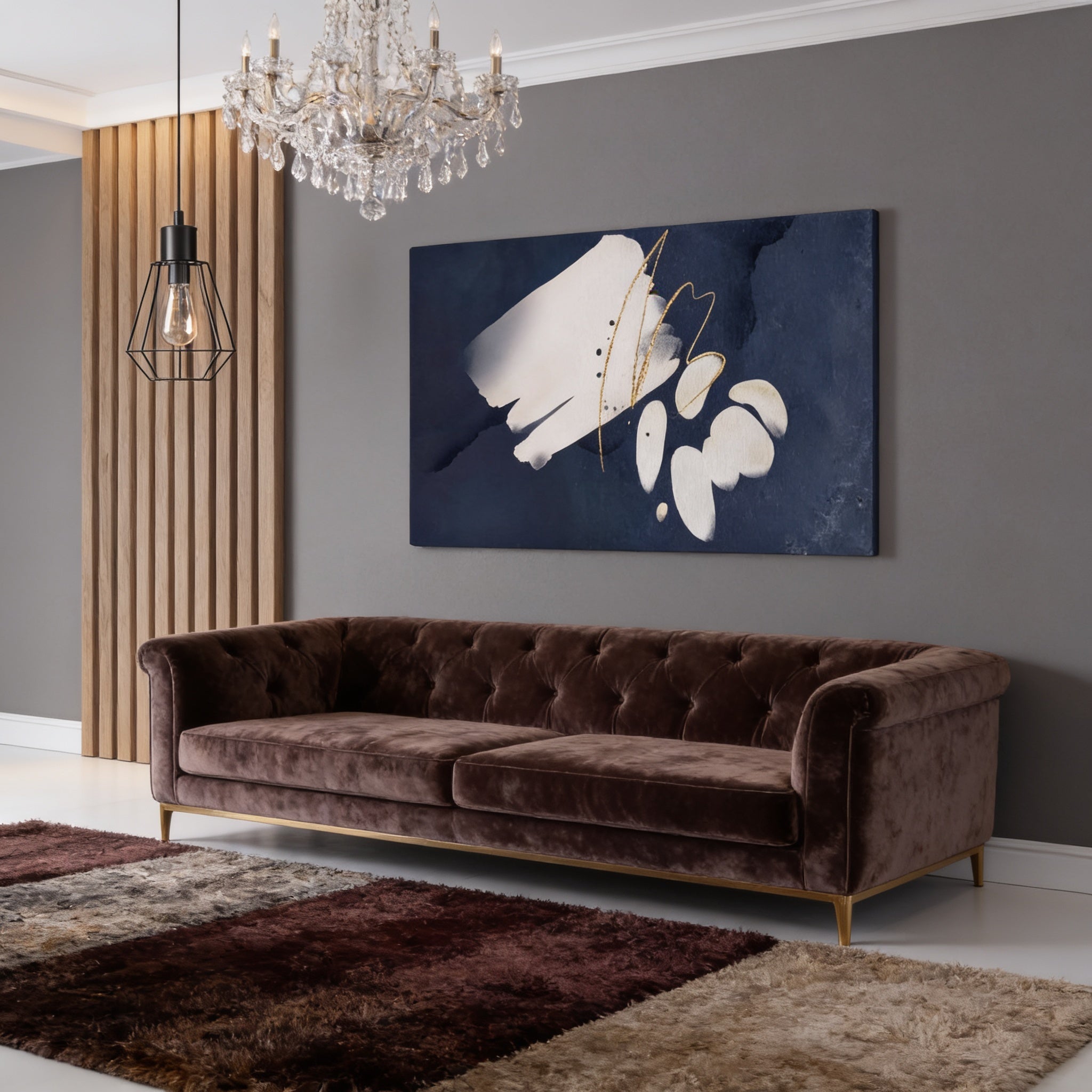 a modern living room with a brown velvet sofa, a large abstract painting on the wall, and a chandelier hanging above the sofa.