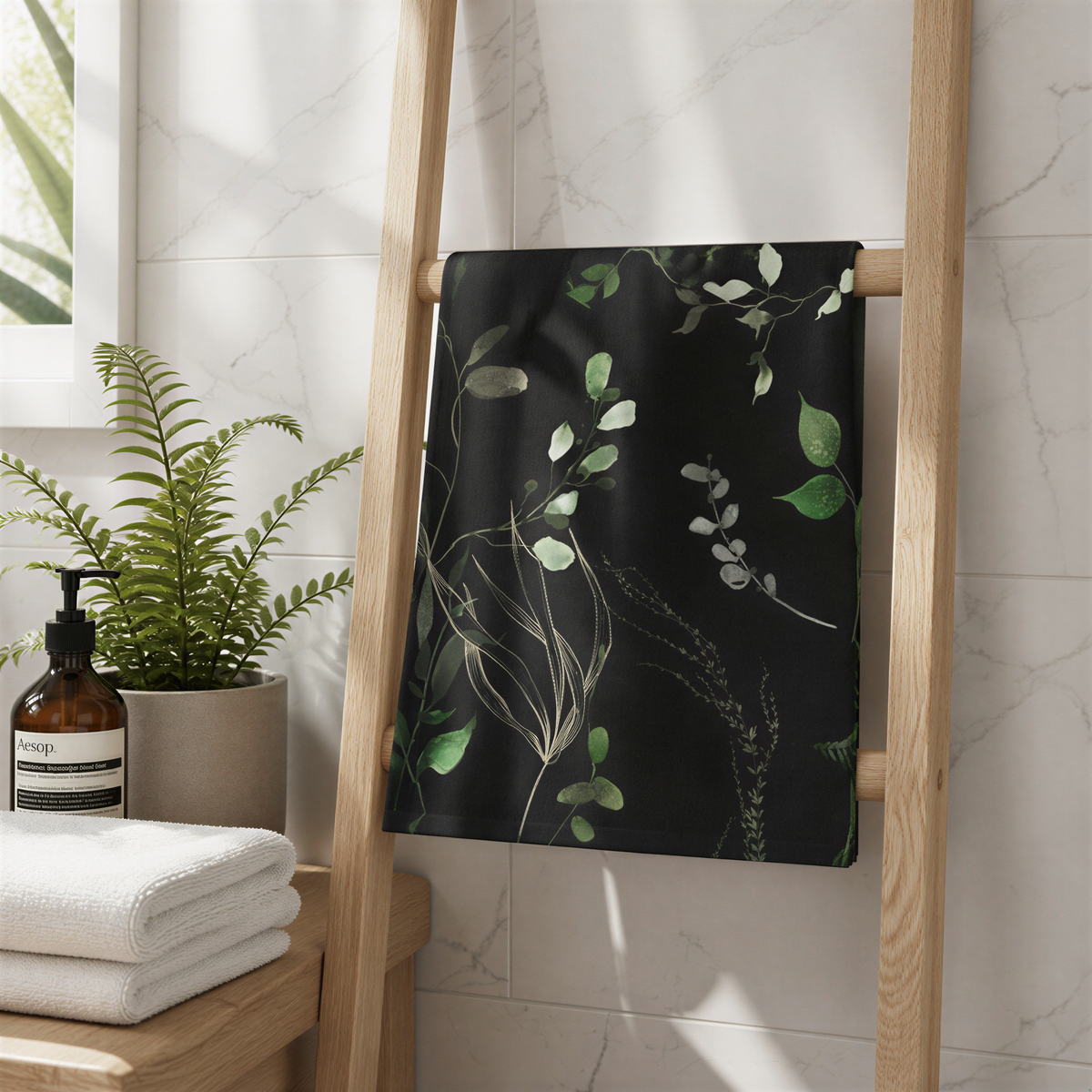 a bathroom setting with a black towel hanging on a wooden ladder, a potted plant, and a bottle of soap on a wooden shelf.