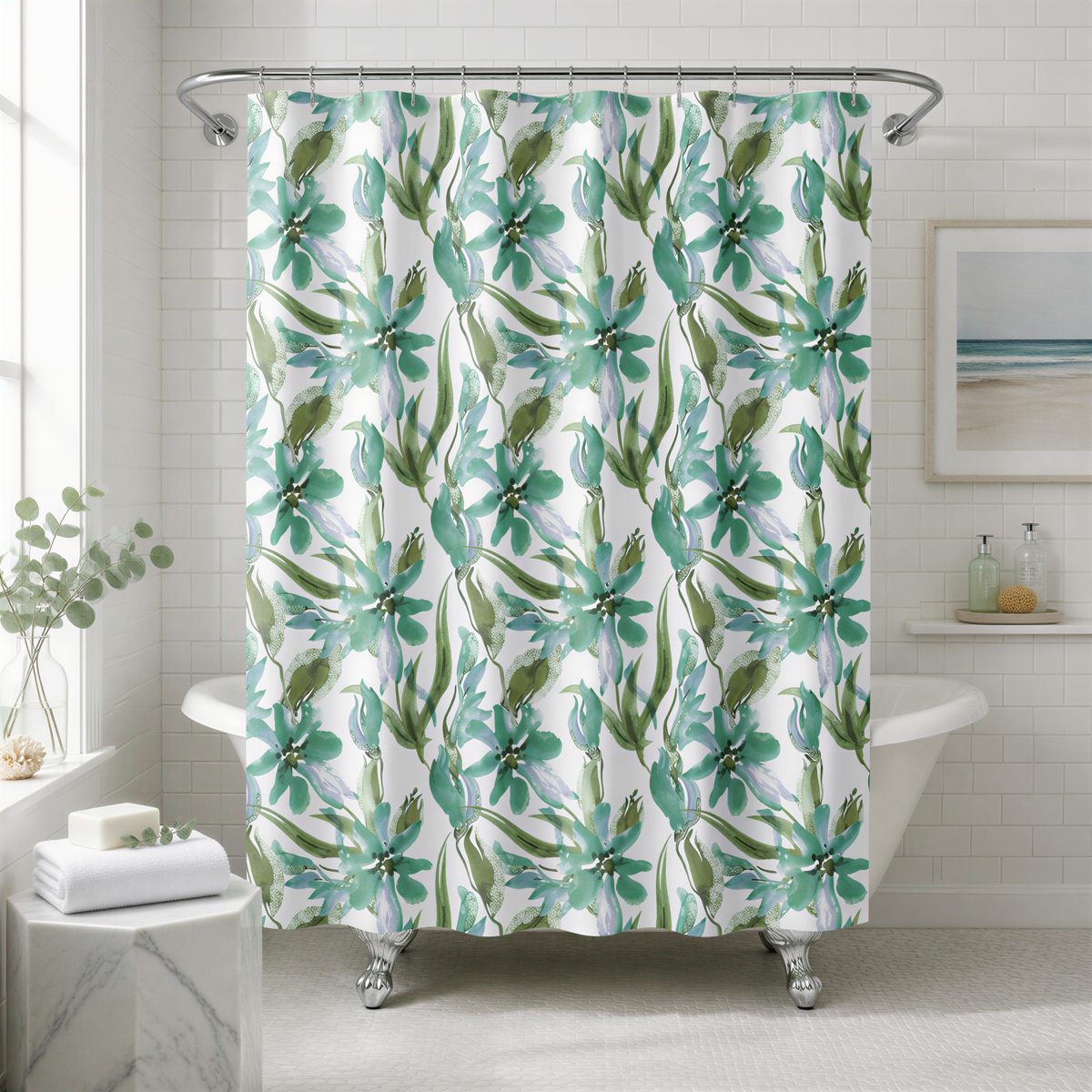 a bathroom with a white bathtub, a shower curtain with a floral pattern in shades of green and white, and a framed picture on the wall.