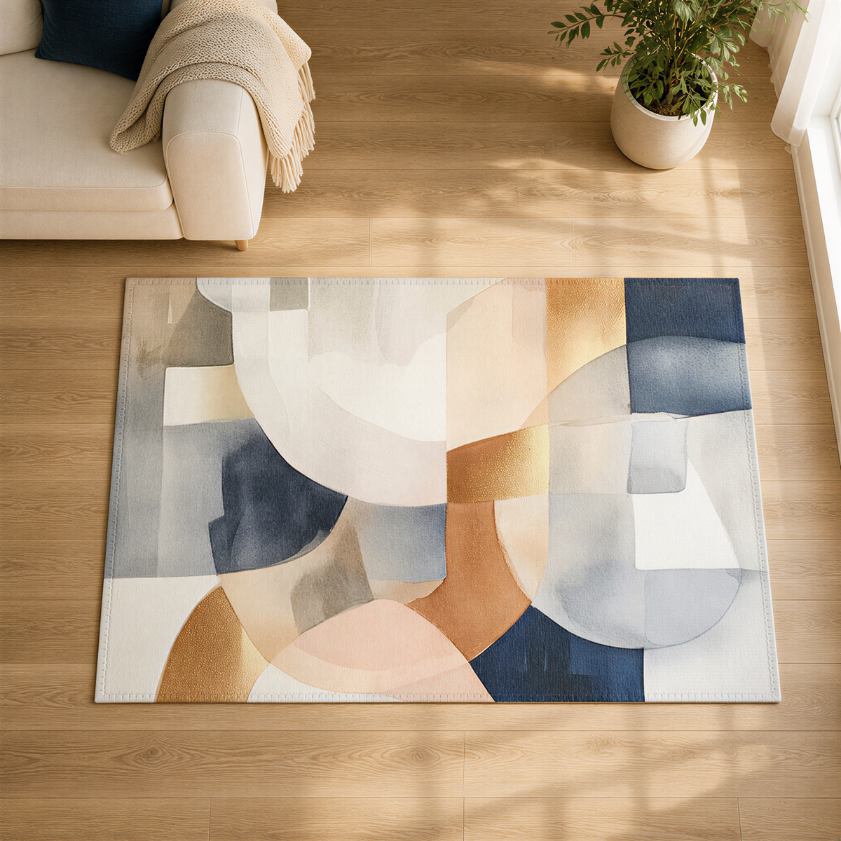 a large abstract rug with a geometric design on a wooden floor, accompanied by a white couch and a potted plant in the background.