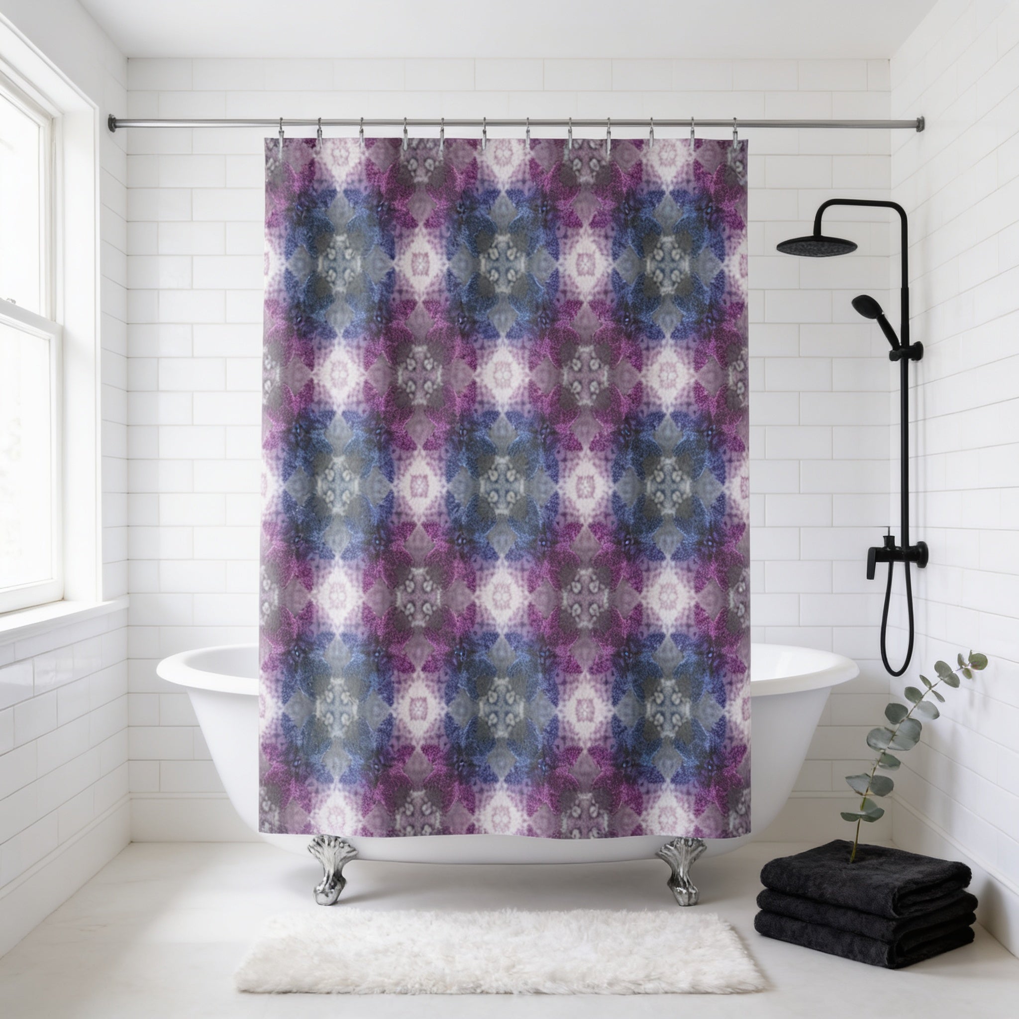 a bathroom with a white bathtub, a shower curtain with a colorful, abstract pattern in shades of purple, blue, and gray, and a black shower head.