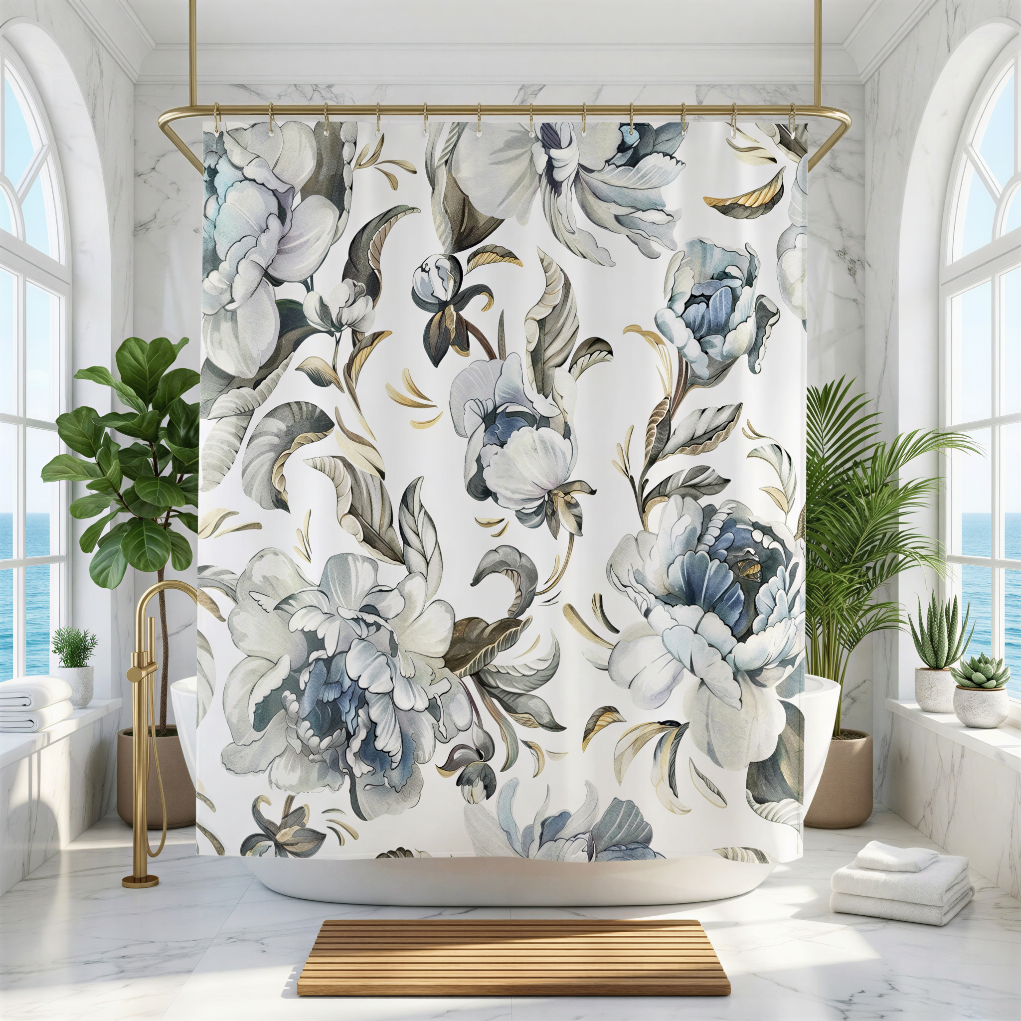 a bathroom with a large floral patterned shower curtain hanging from a gold rod. The shower curtain has a mix of white, blue, and gray colors, and it appears to be a decorative piece in the bathroom. The bathroom has a marble-like finish, and there are several potted plants placed around the room, adding a touch of greenery to the space.