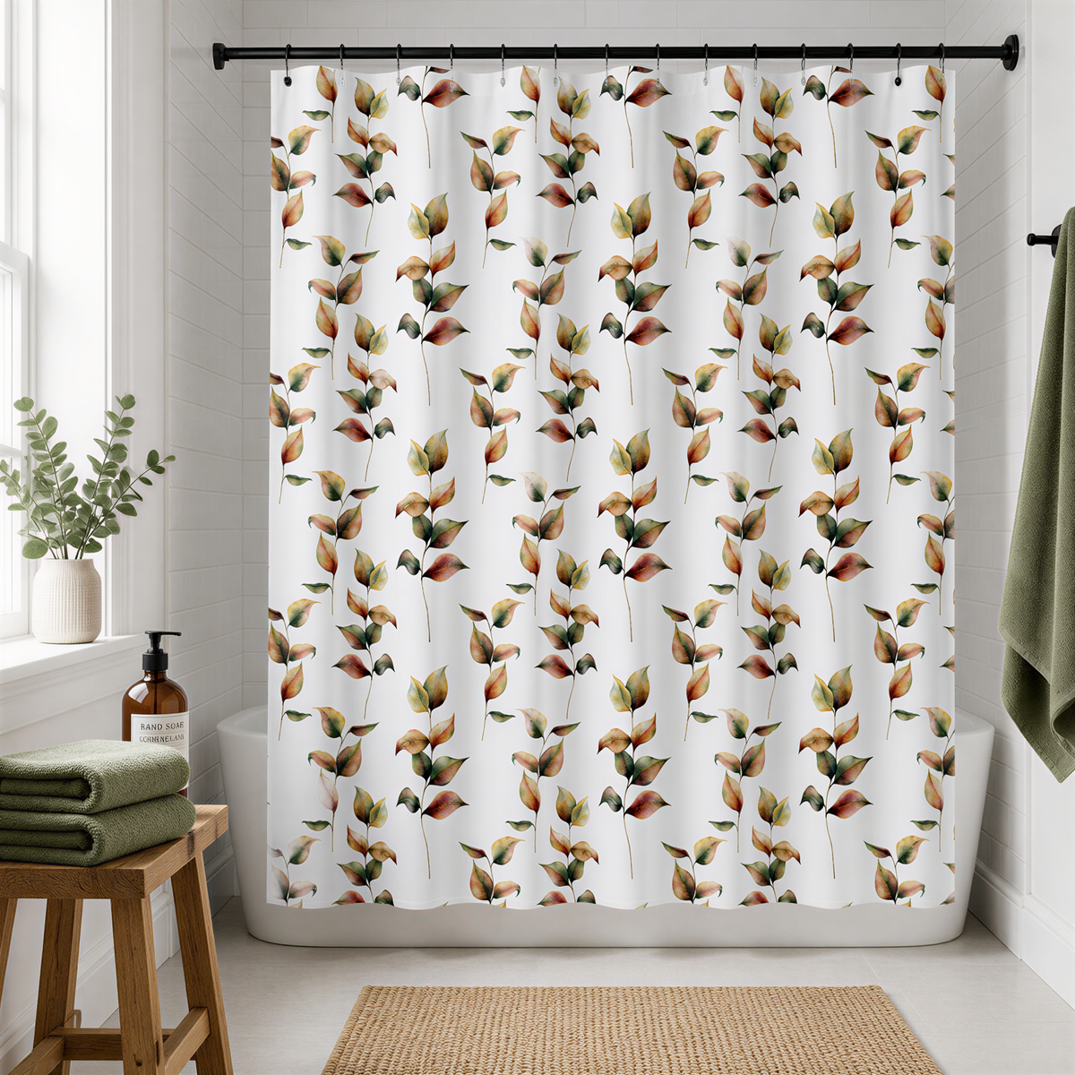 a bathroom with a shower curtain adorned with a repeating pattern of leaves in various shades of green, orange, and brown. The shower curtain is hanging from a rod, and there is a wooden stool and a green towel visible in the room.