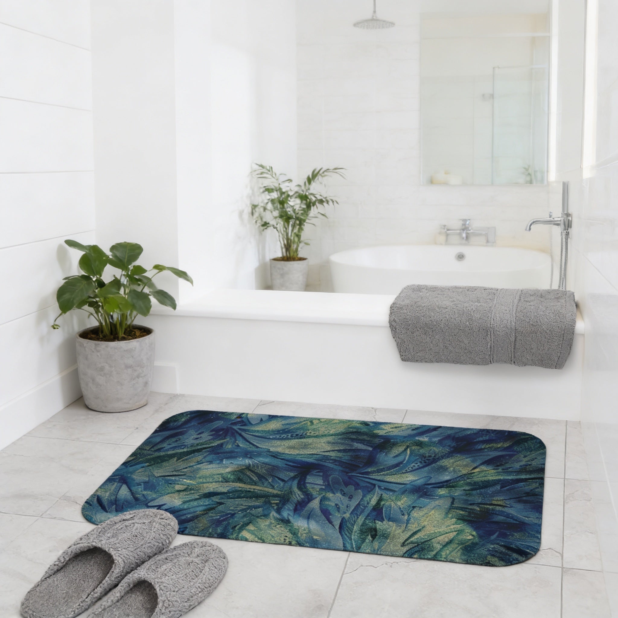 a modern bathroom with a white bathtub, a blue and green patterned bath mat, and a pair of gray slippers on the floor.