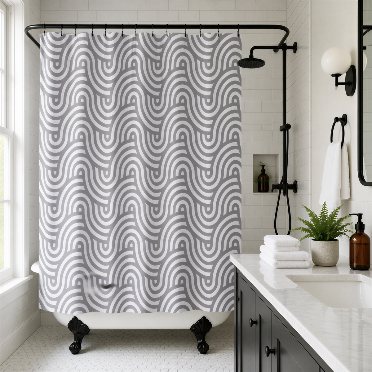 A modern bathroom with a white bathtub, a shower curtain with a repeating gray and white wave pattern, and a black shower head.