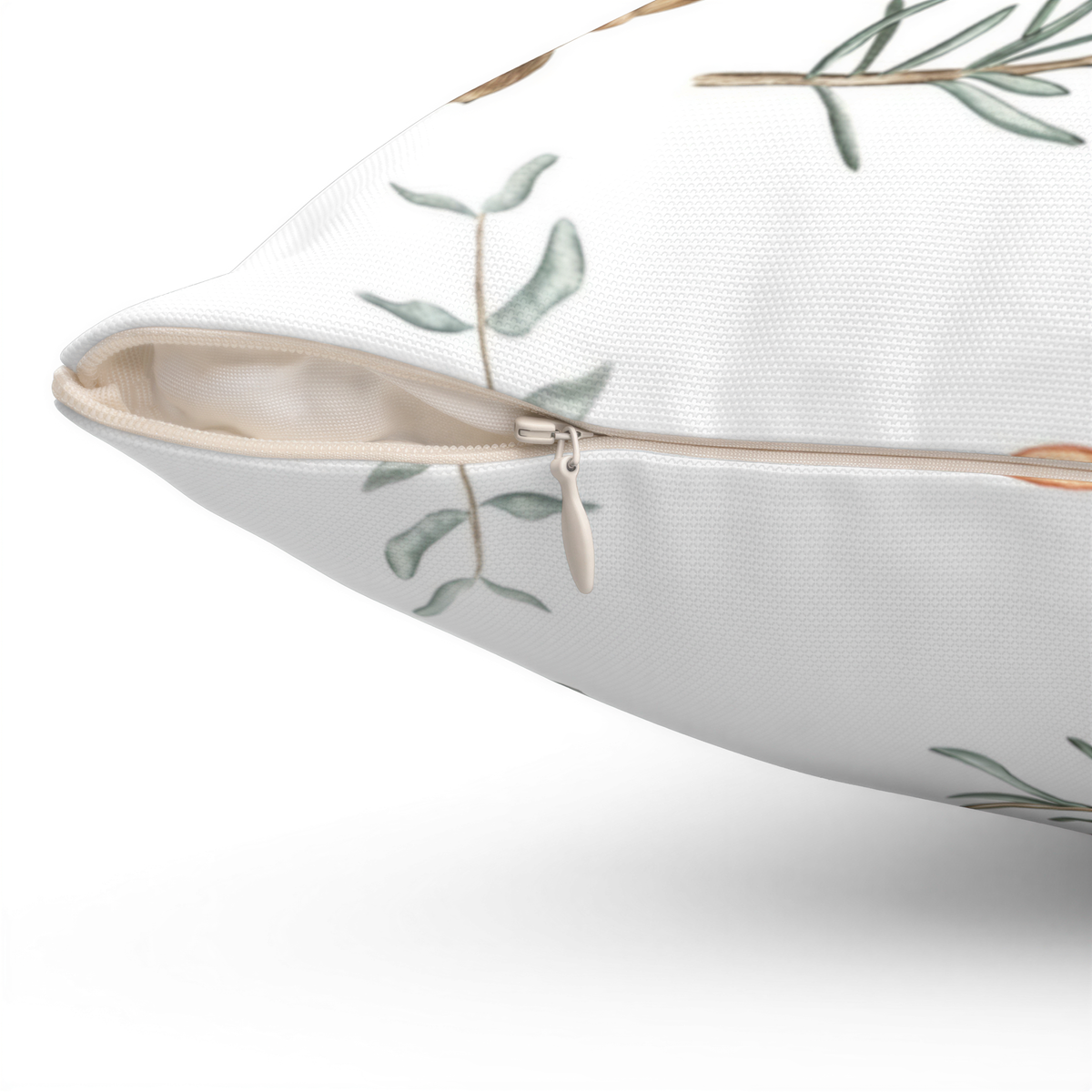 Floral citrus pine needles Christmas pillow cover, styled on a couch