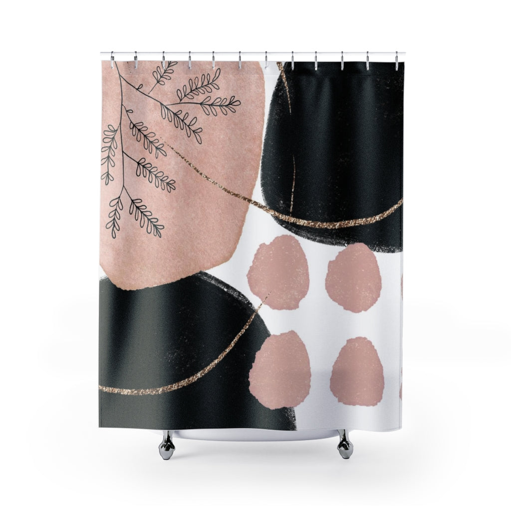 a shower curtain with a black and white design