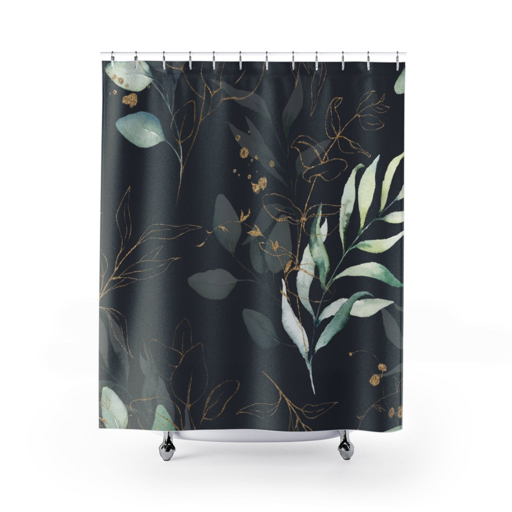 a black shower curtain with a green leaf pattern