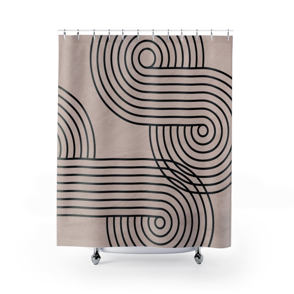 a shower curtain with a black and white swirl design