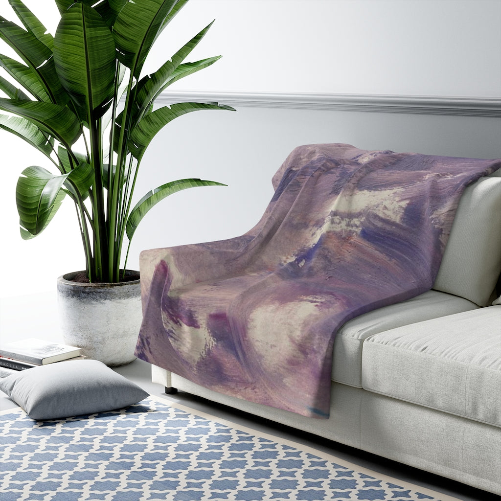 Lavender, purple and cream abstract comfy throw blanket on a bed