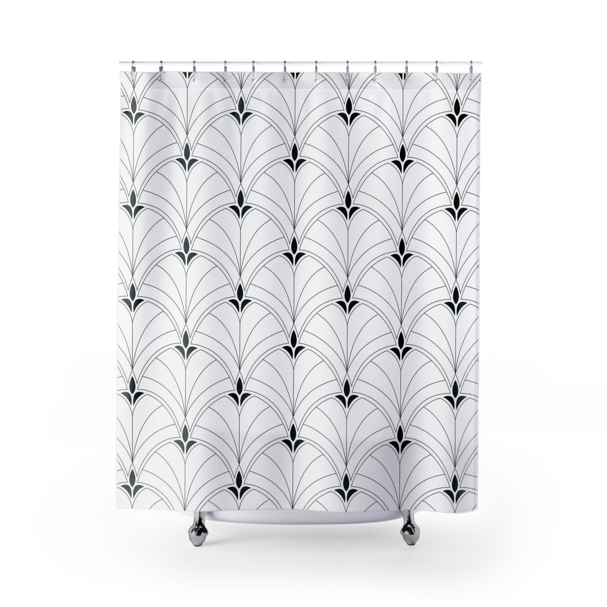 a white shower curtain with a black and white design