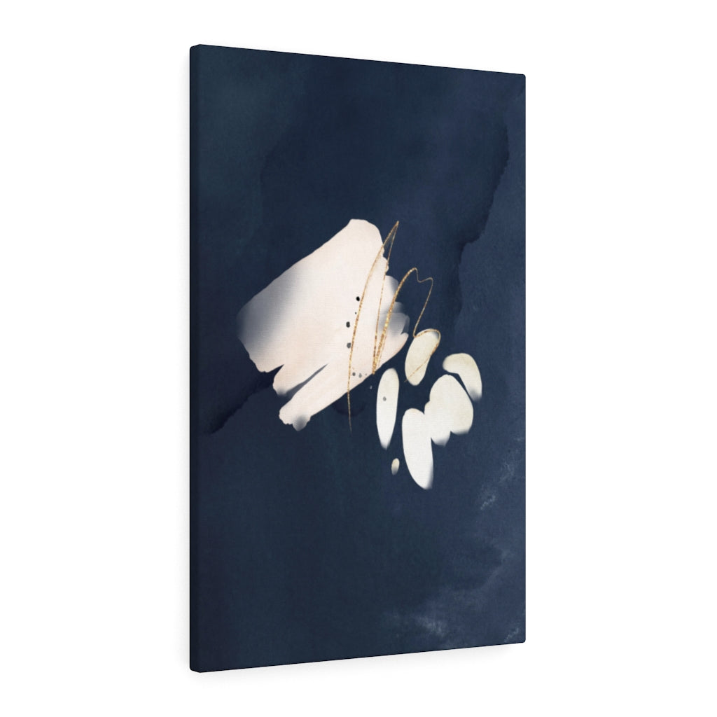 Navy blue, cream and white abstract wall canvas art in a bright contemporary space