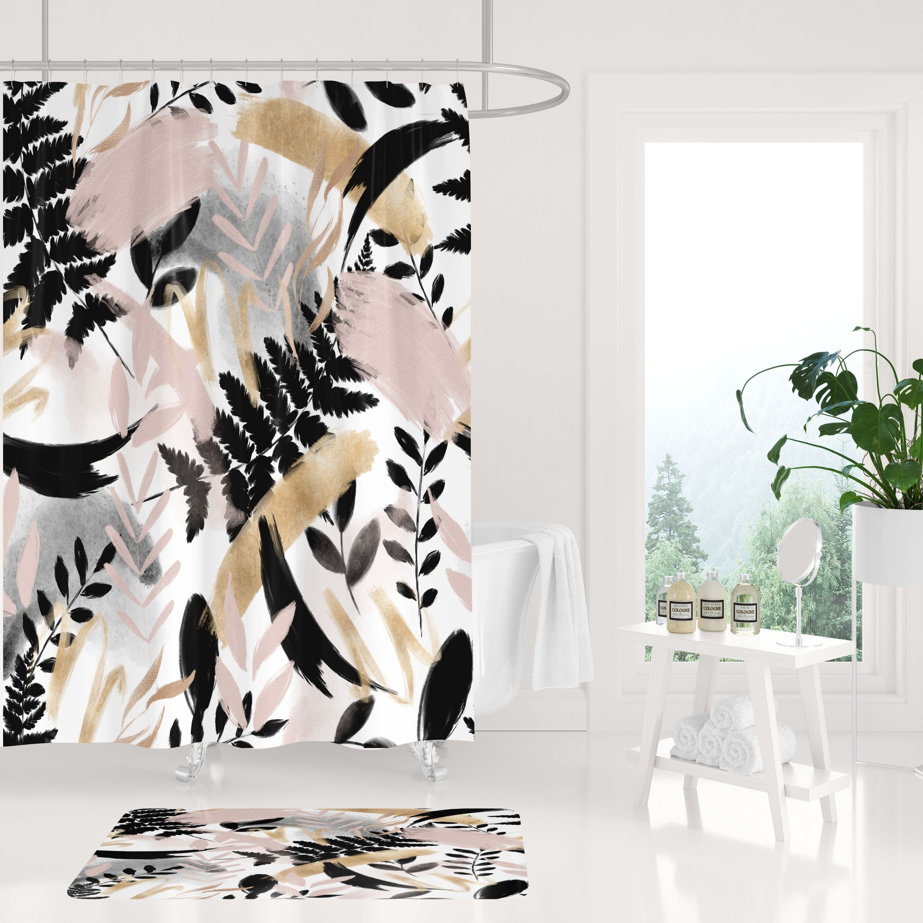 a bathroom with a black floral shower curtain