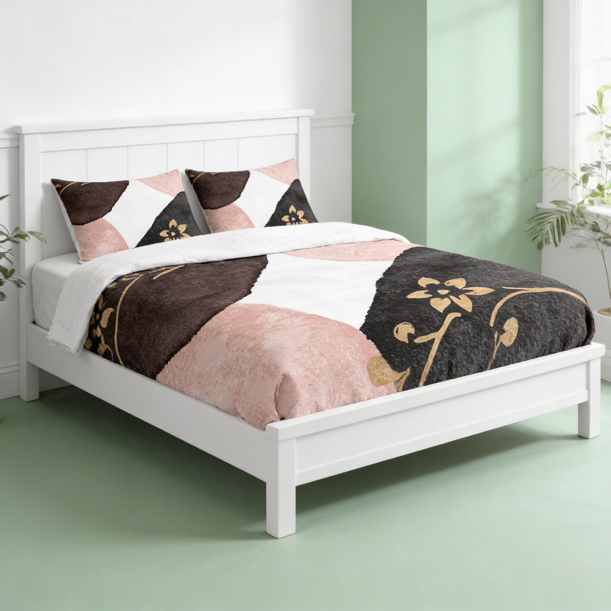 a white wooden bed with a colorful, patterned comforter and pillows. The bed is set against a green wall, and there are two potted plants in the room.