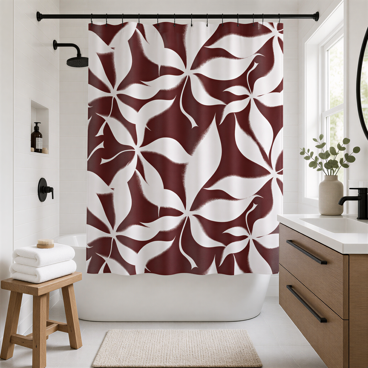 a modern bathroom with a white bathtub, a wooden stool, and a shower curtain with a floral pattern in burgundy and white colors.