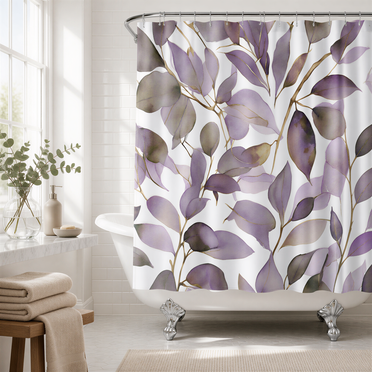 a bathroom with a white bathtub, a shower curtain with a leaf pattern, and a window. There is also a small plant on the windowsill and a folded towel on the floor.