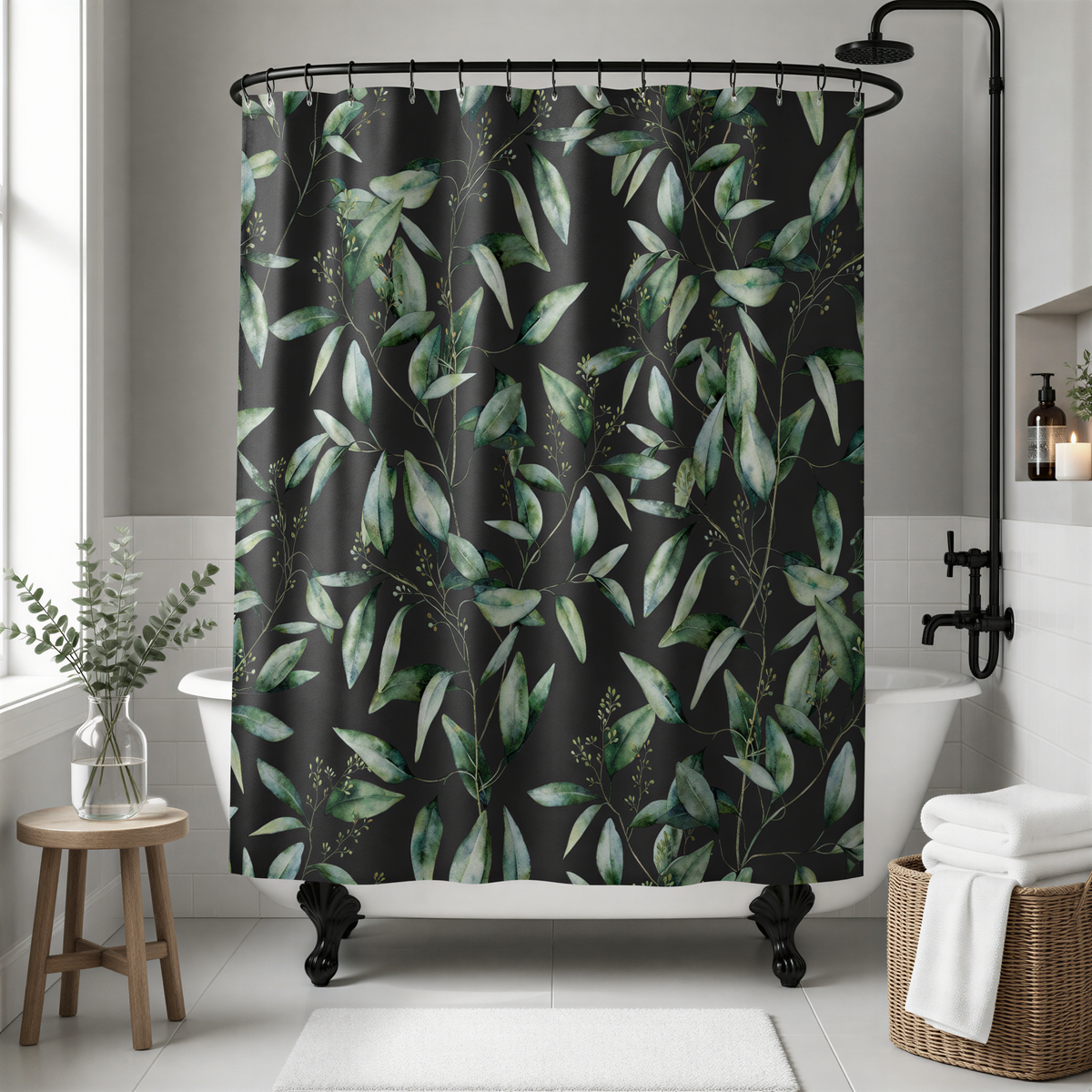 a bathroom with a black shower curtain adorned with a pattern of green leaves and branches. The shower curtain is hanging from a rod above a white bathtub. The bathroom also includes a wooden stool, a wicker basket, and a potted plant, creating a cozy and inviting atmosphere.