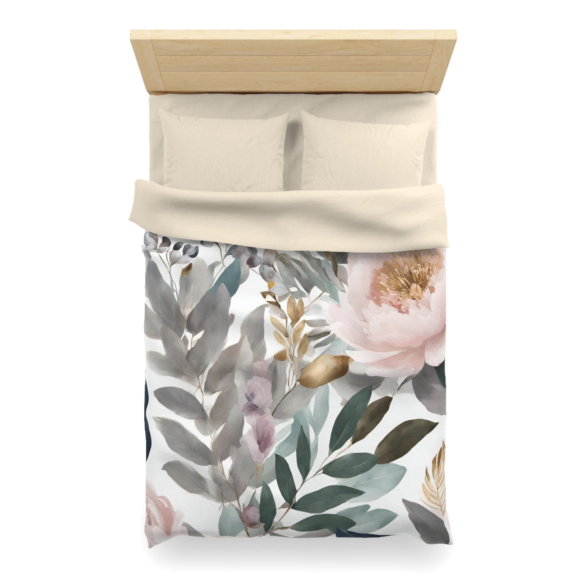 a bed with a floral print duvet cover and pillows.