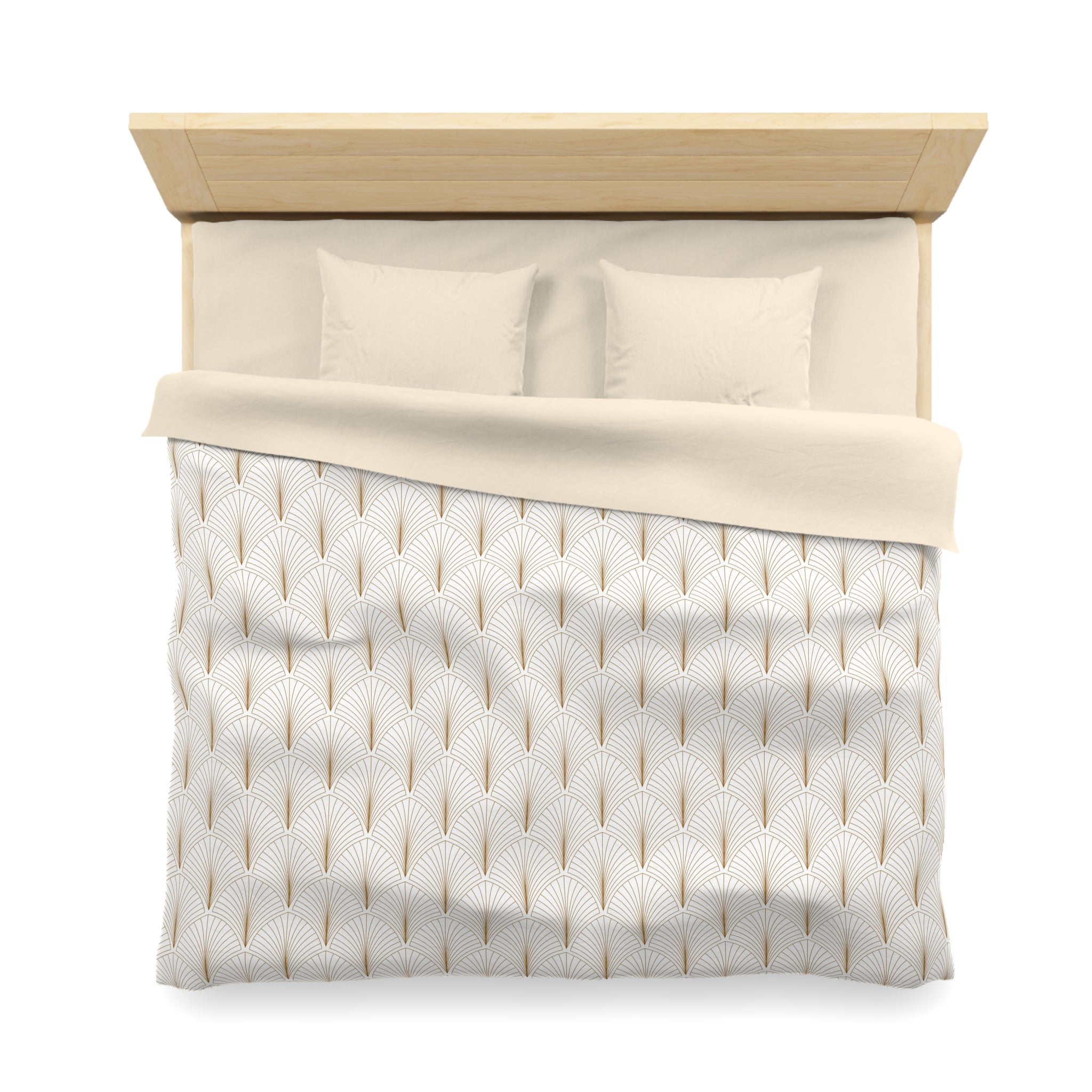 A neatly made bed with a white and gold patterned comforter and pillows.