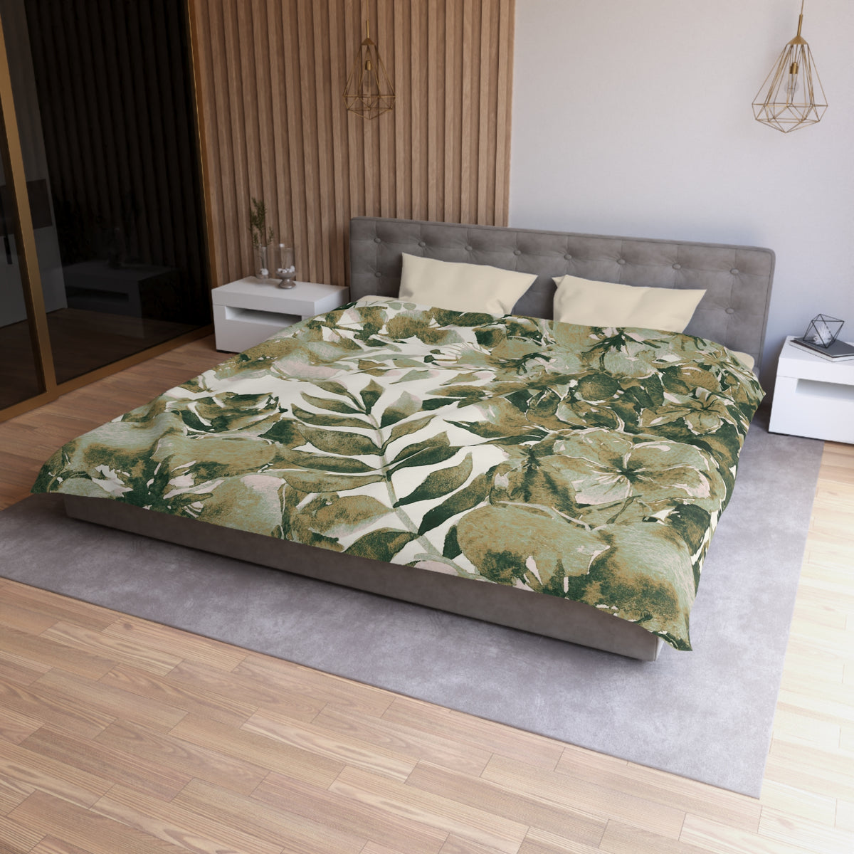 a modern bedroom with a large bed covered in a green and white leaf-patterned comforter. The bed is positioned against a wall with a wooden paneling design. The room also features a nightstand, a pendant light, and a mirror.